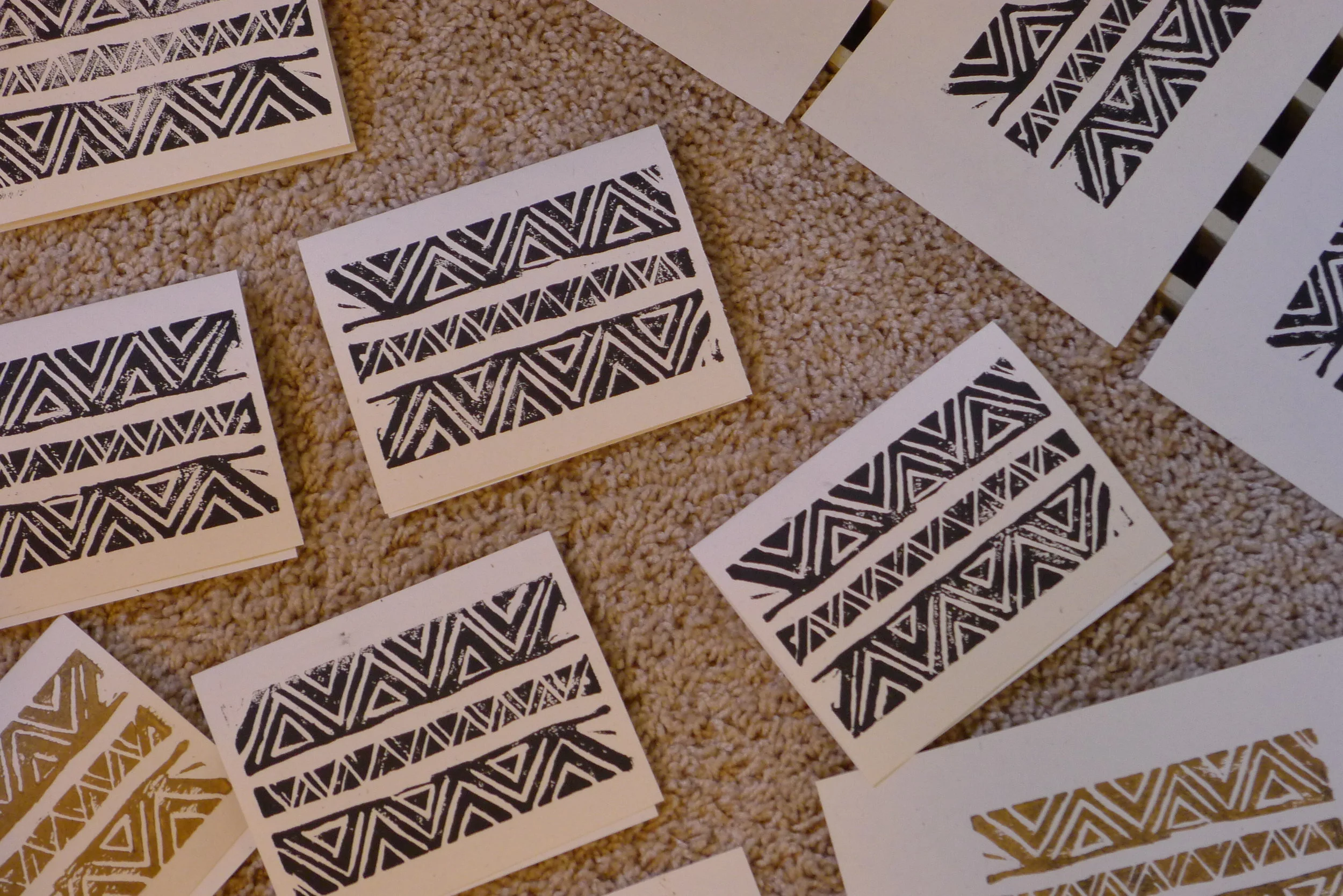  lino-block print workshop, participant design, mud cloth motif on a blank card 