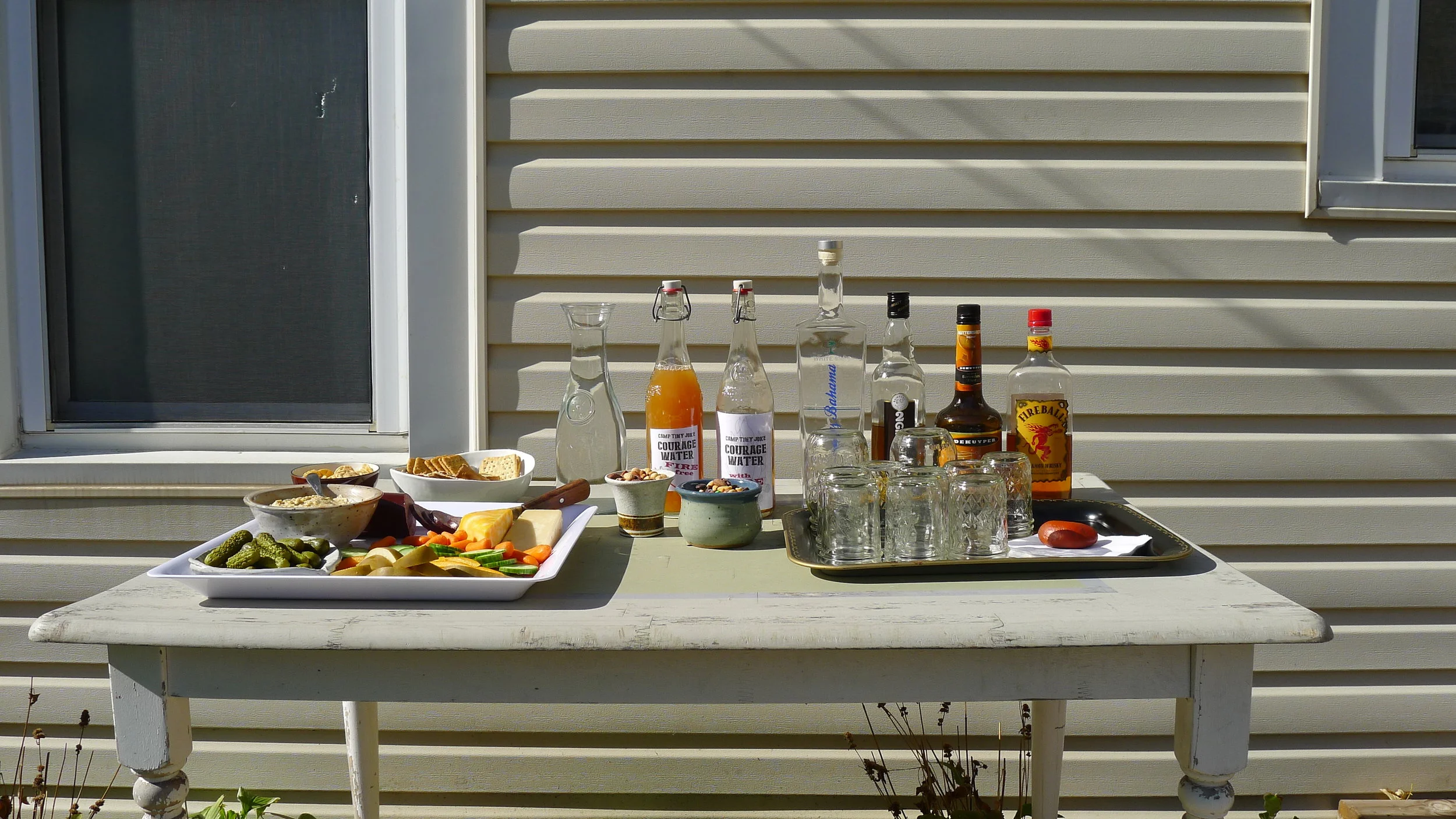  full bar with refreshments and a bottle of camp courage 