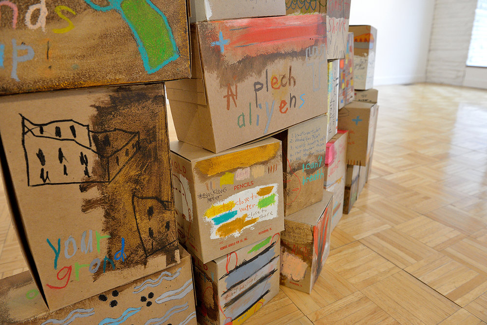   Aimee Joyaux ,  The Box Project , installation view, 2016  Shellac, oil stick, oil pastel, colored pencil, ball point pen, craft paper boxes, 11.5” x 8” x 5”  Image courtesy of the artist 