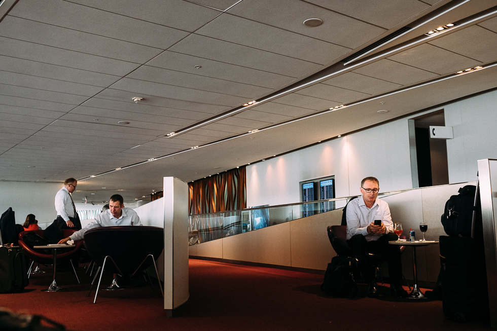 In the airport lounge. Always dudes in white shirts.