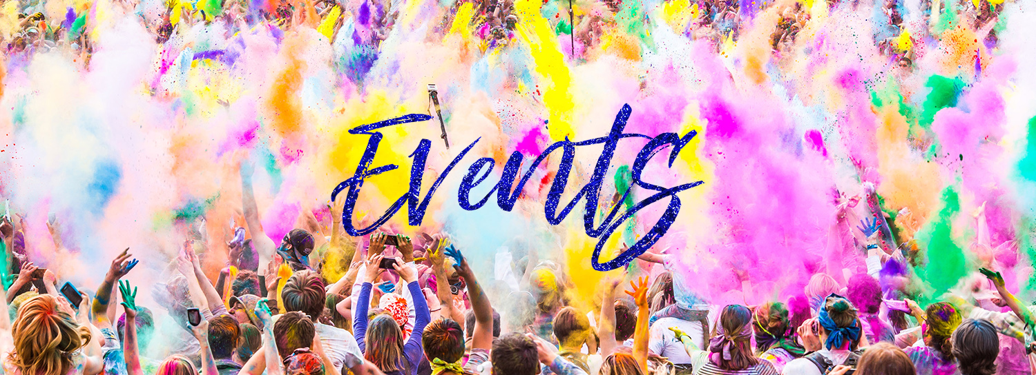 crowds of people outside having fun during color festival showing events and celebrations