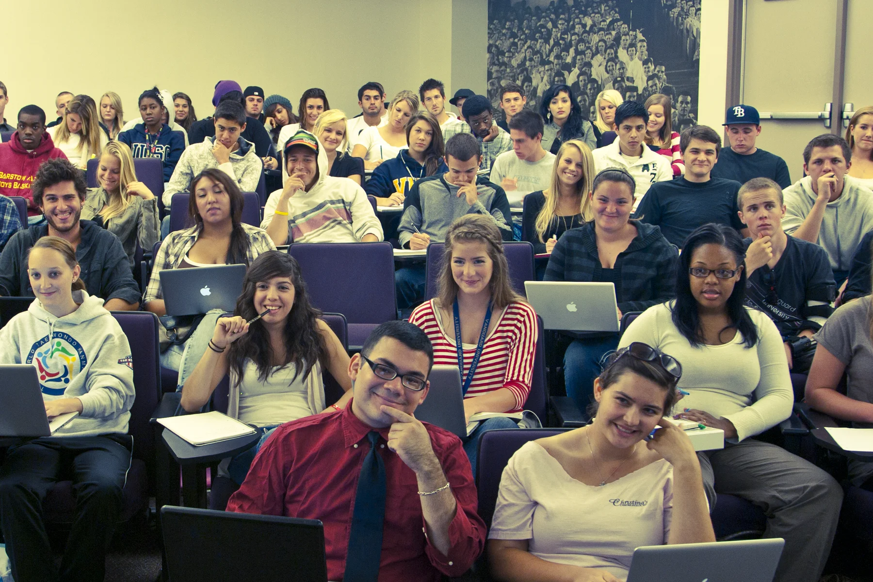 classroom full of students at weekly bible institute classes learning from rock church leaders