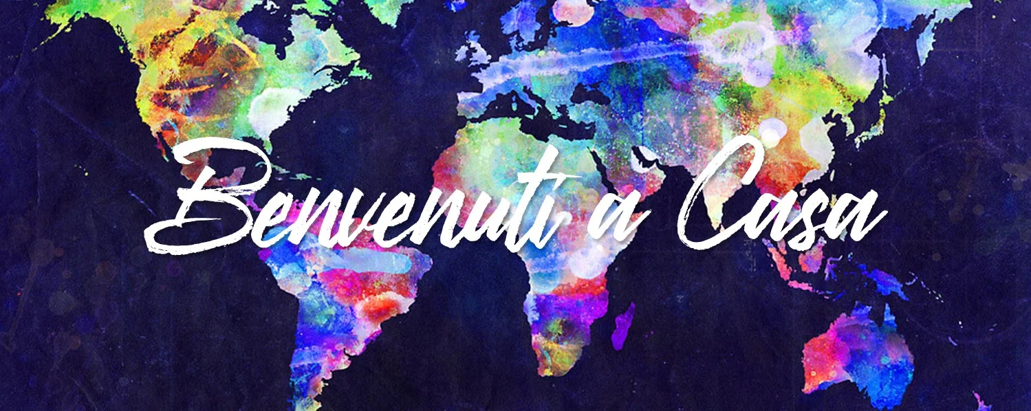 Mappa colorata in tutto il mondo di nazioni in tutto il mondo che dicono benvenuto a casa