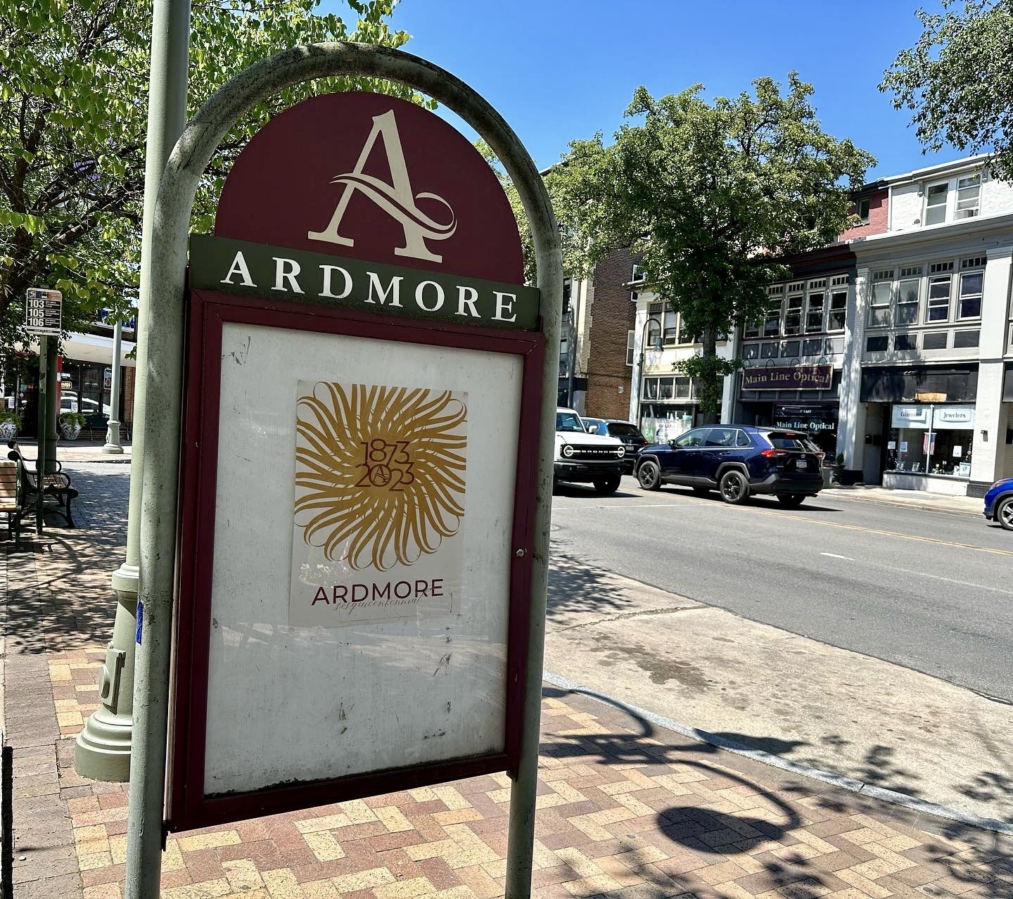 Ardmore Sesquicentennial poster in Schauffele Plaza, downtown Ardmore