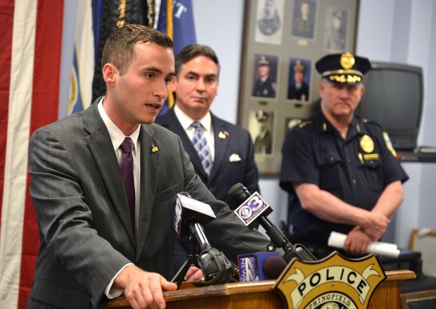 Mike speaking at a press conference announcing new Pawn Shop regulations. 