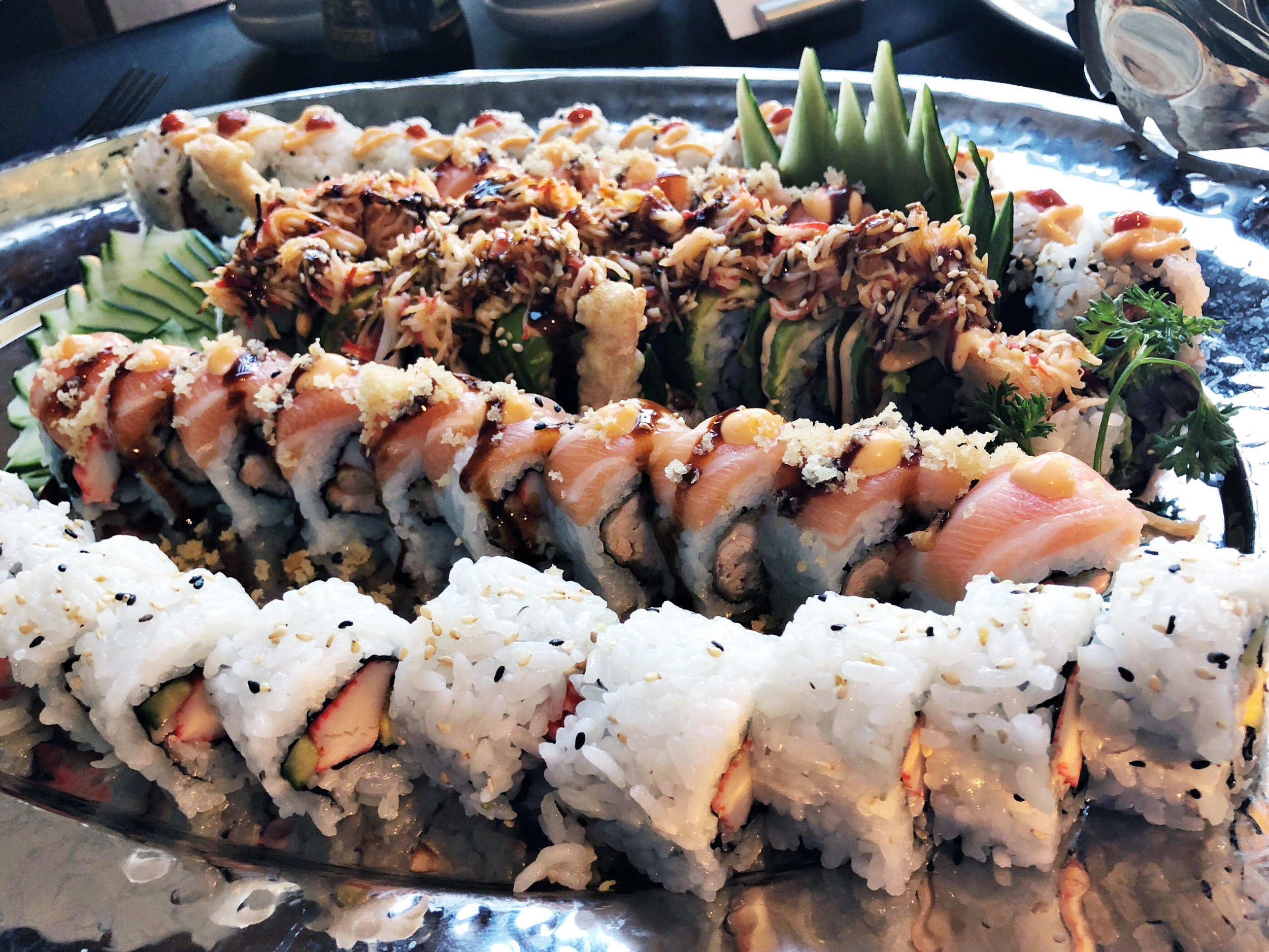 Splitzville offers a wide selection of menu items, including sushi.