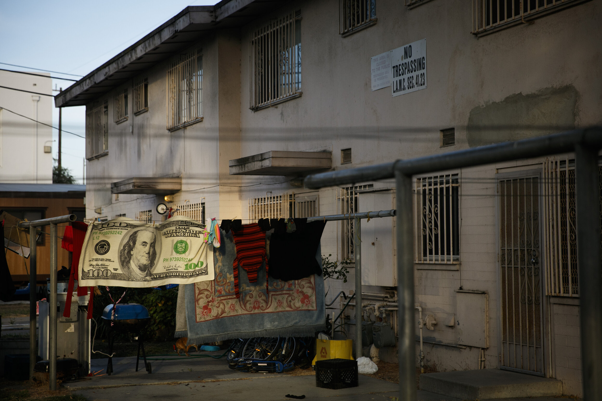  Laundry hangs on a clothesline outside an apartment building at the Jordan Downs housing project in the Watts neighborhood of Los Angeles, Monday, June 15, 2020. (AP Photo/Jae C. Hong) 