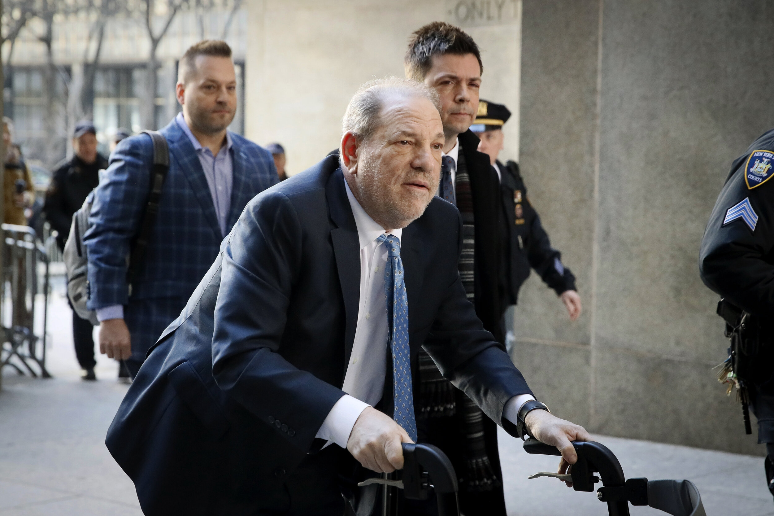In this Feb. 24, 2020 file photo, Harvey Weinstein arrives at a Manhattan courthouse as jury deliberations continue in his rape trial in New York. Weinstein was transferred to a state prison in New York on March 18, to begin a 23-year sentence for r…