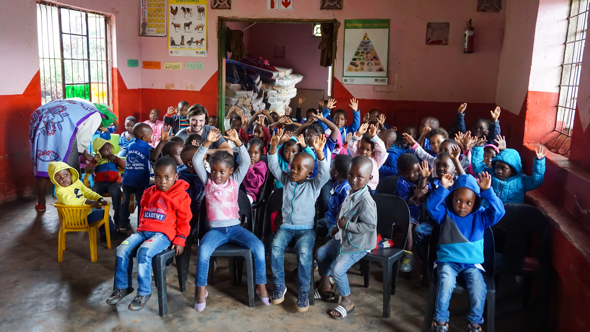 School kids next door to the textiles workshop
