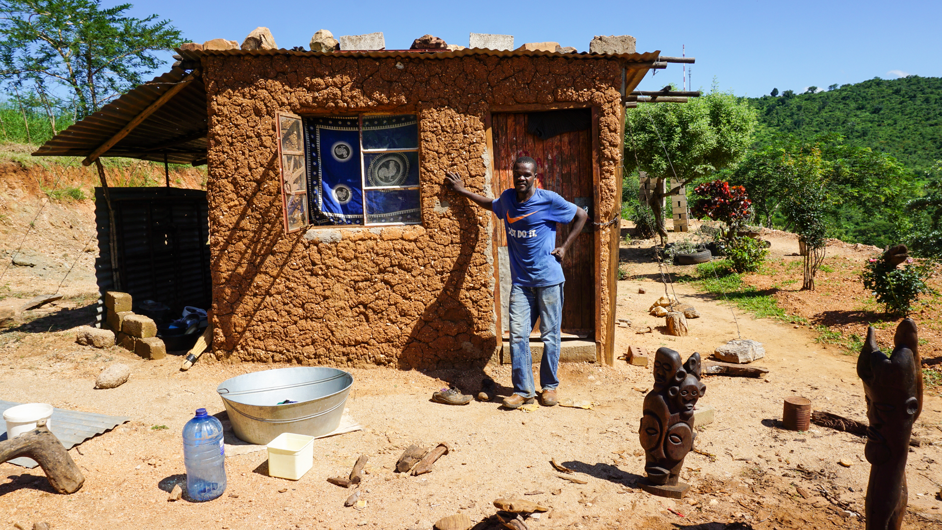 Paul outside his hut overlooking he Limpopo countryside