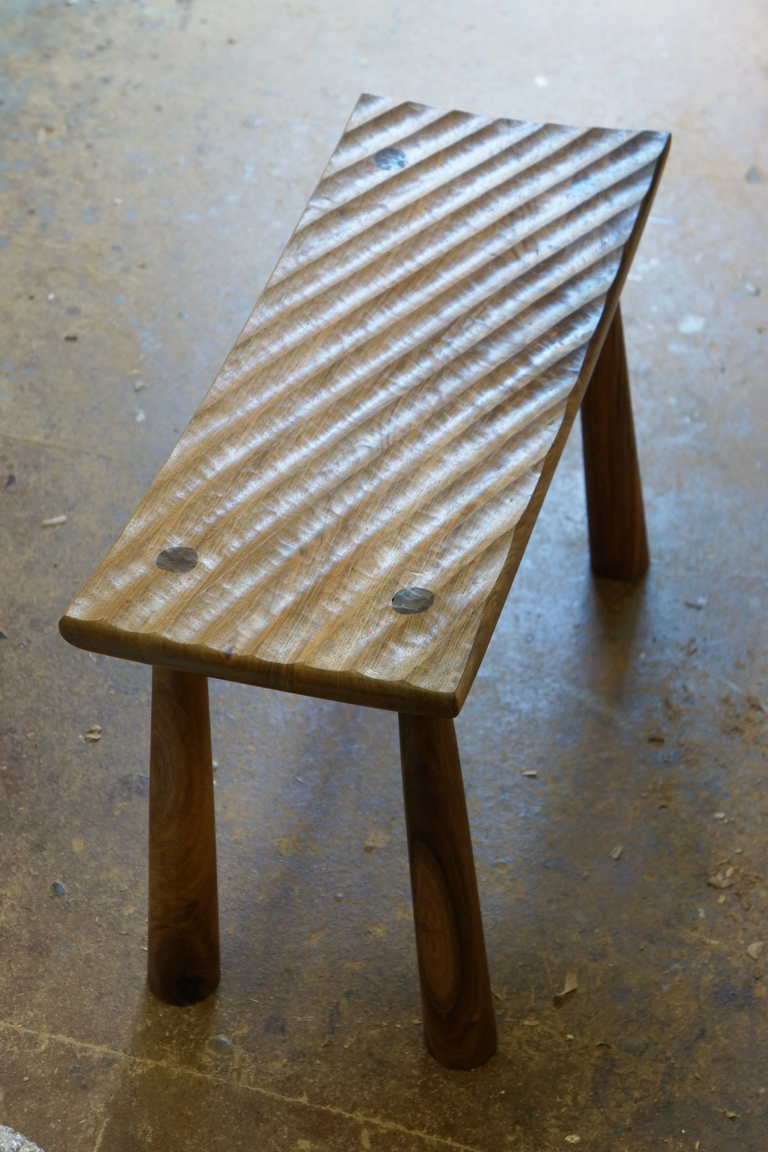  A walnut stool. 