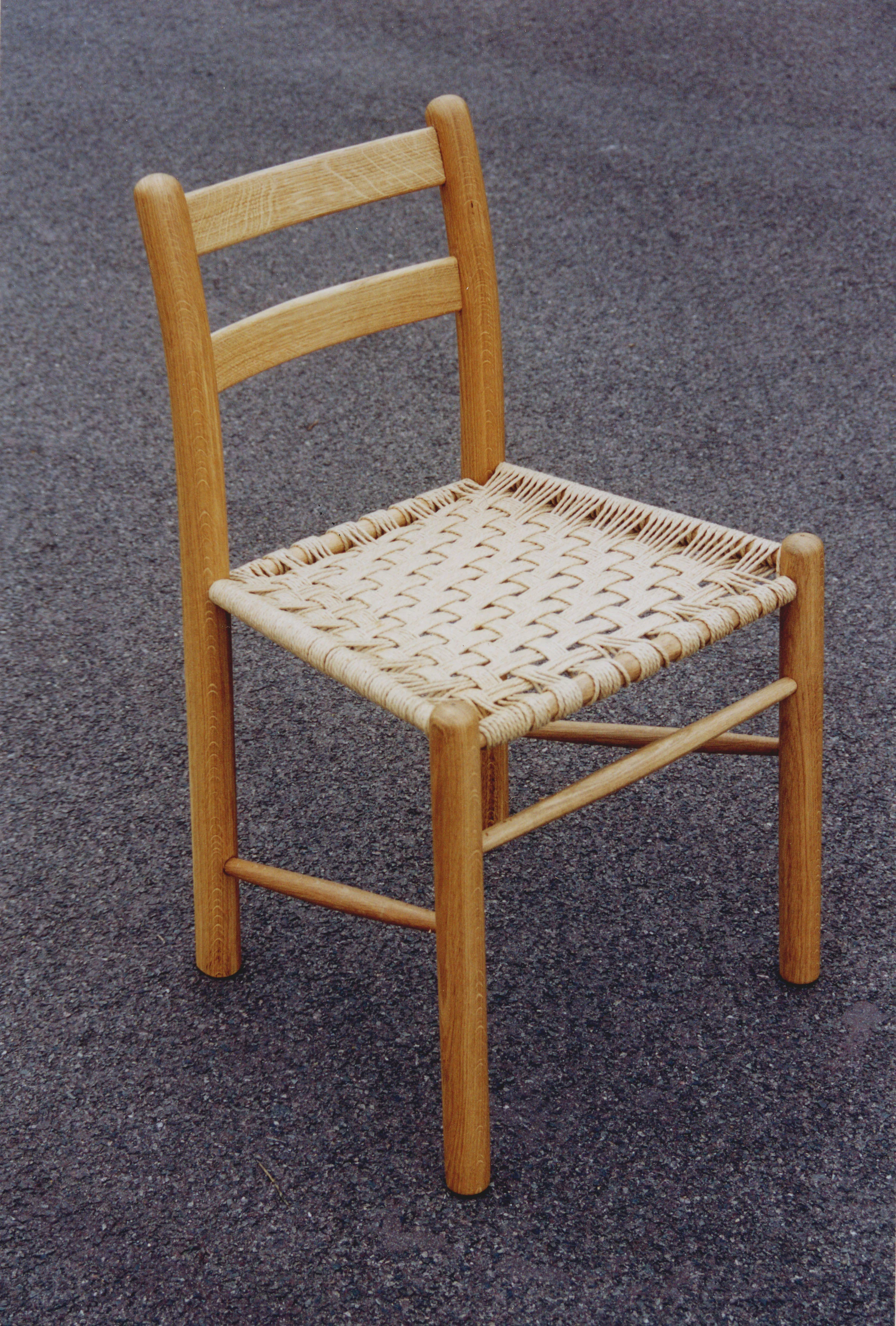  An Oak and Seagrass dining chair 