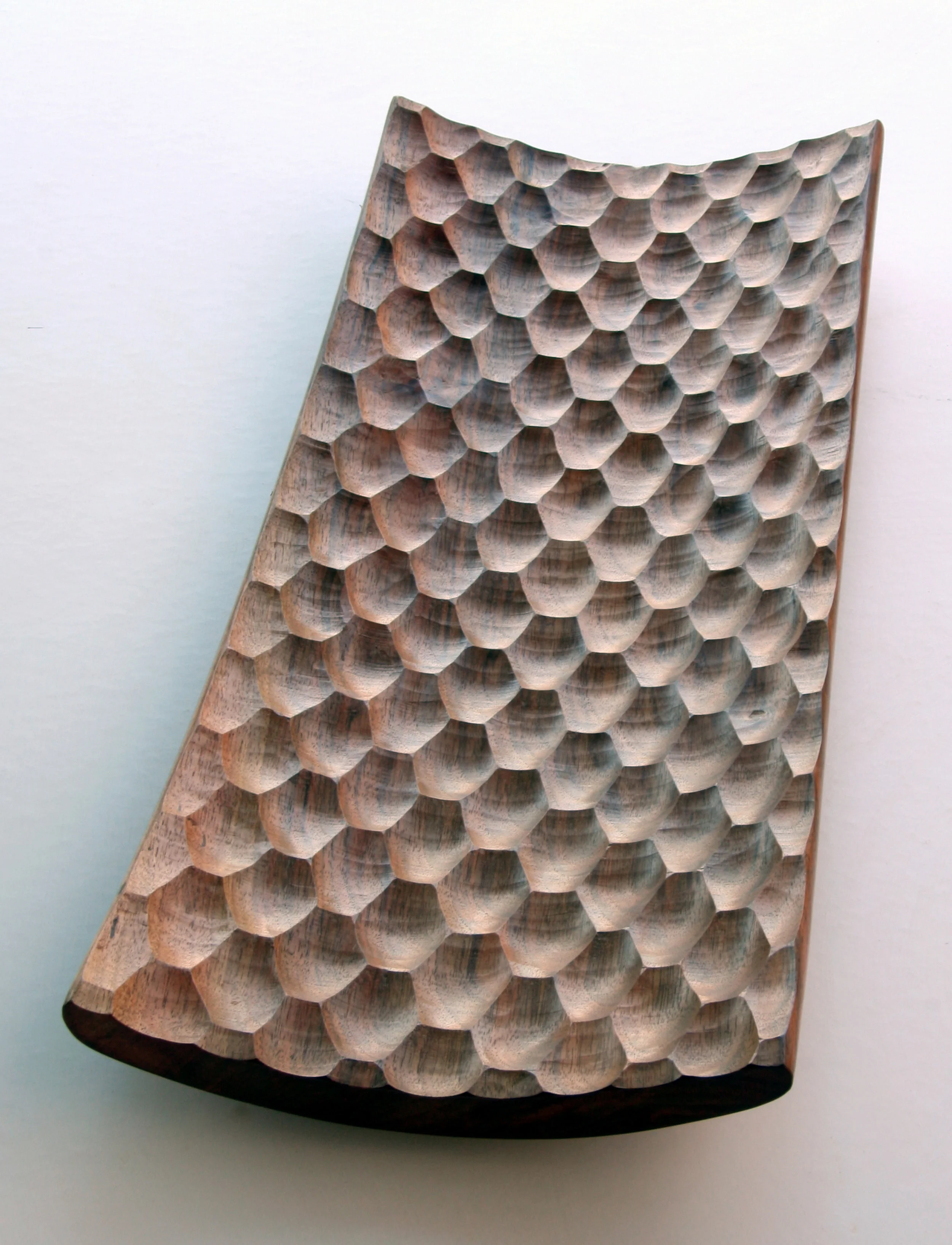  A long faceted Walnut platter. 