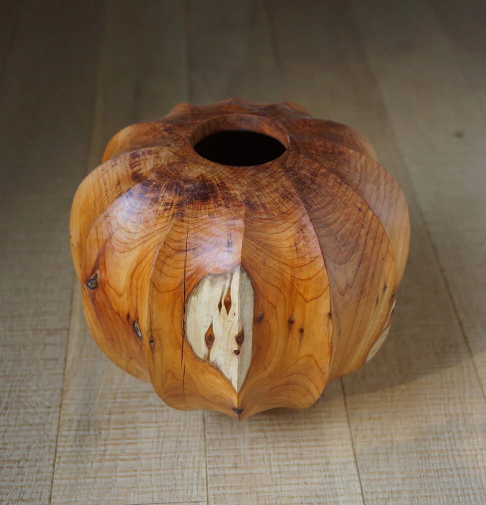 Turned and carved Yew vessel