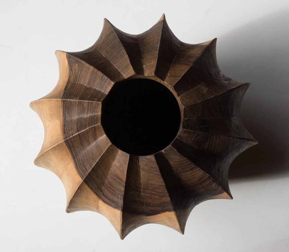 Turned and carved Walnut vessel