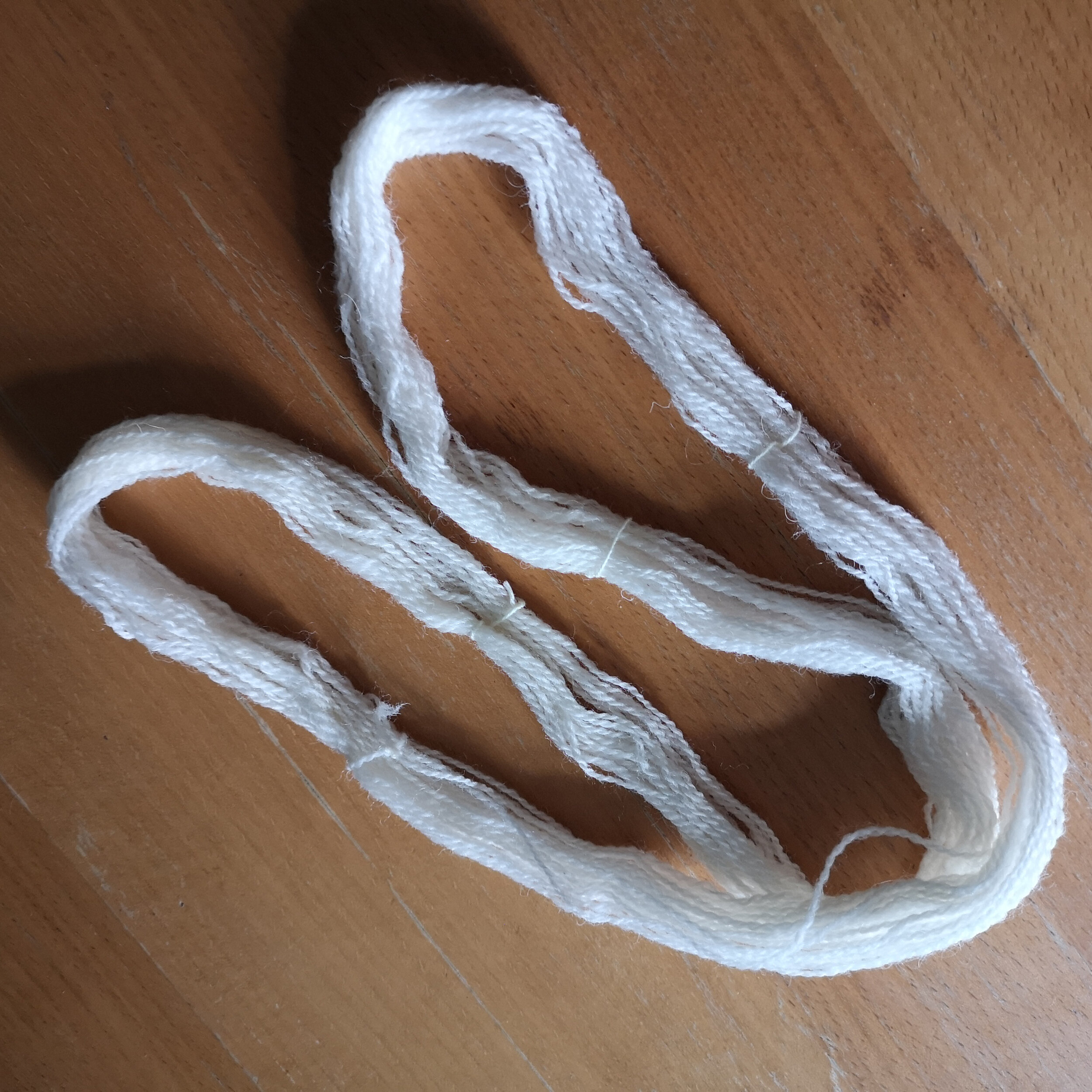 Skein tied in 4 places with string