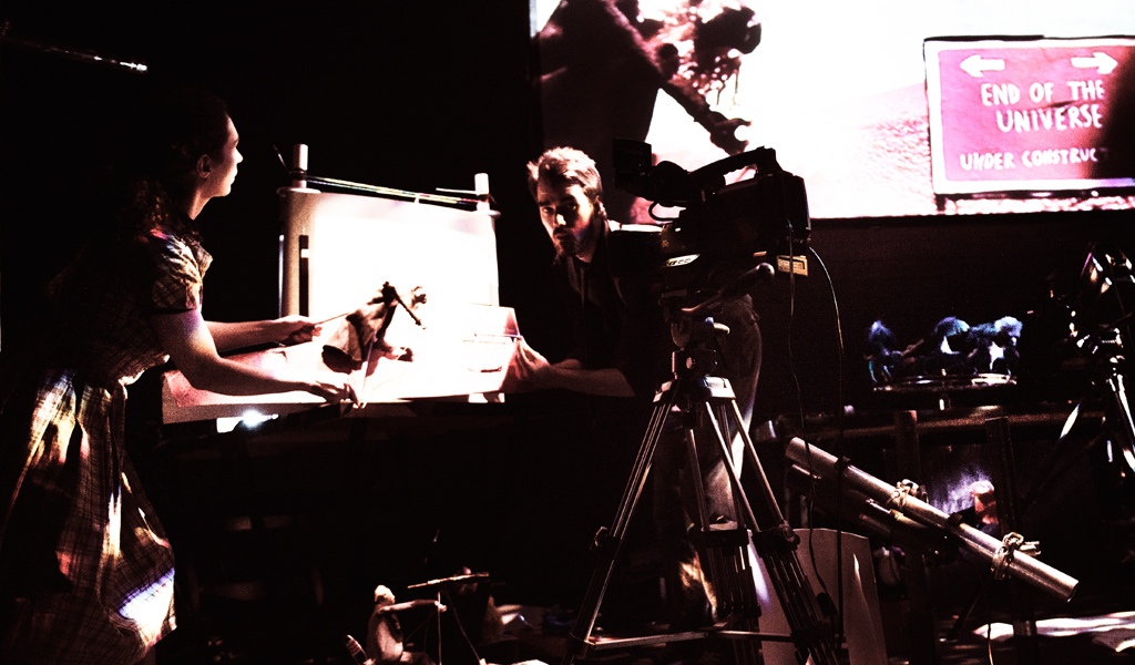 Ben Whybrow operating puppets in Something Very Far Away