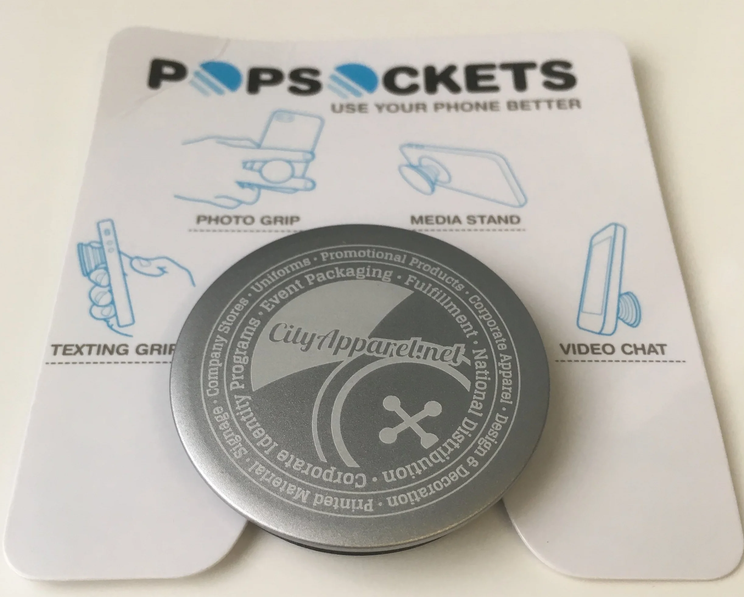 City Apparel's latest Pop Socket. Made out of Aluminum & is laser engraved. 