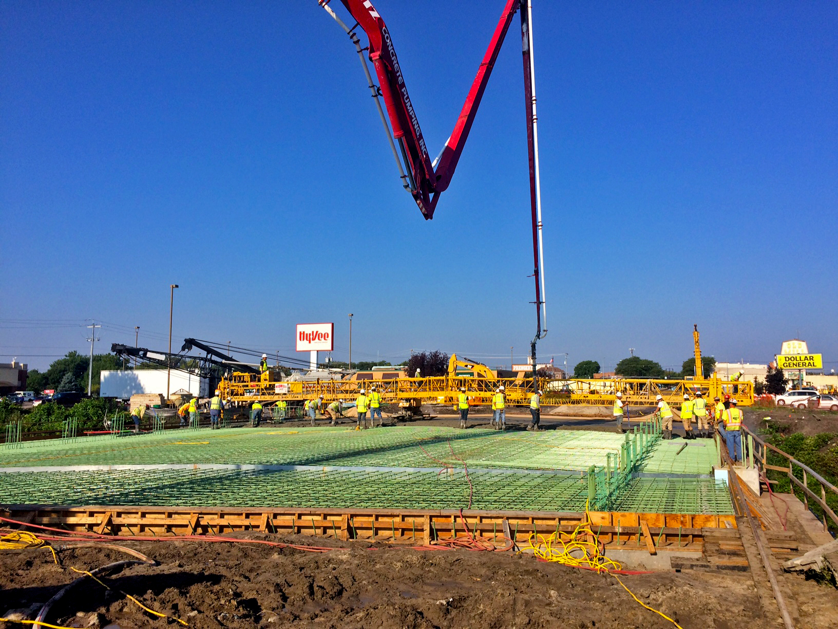 Photos by CHUCK PEARSON/Gerhold Concrete Co.Gerhold Concrete Co. places the bridge deck of Norfolk Avenue, part of renovations on the busy street in Norfolk, Neb.