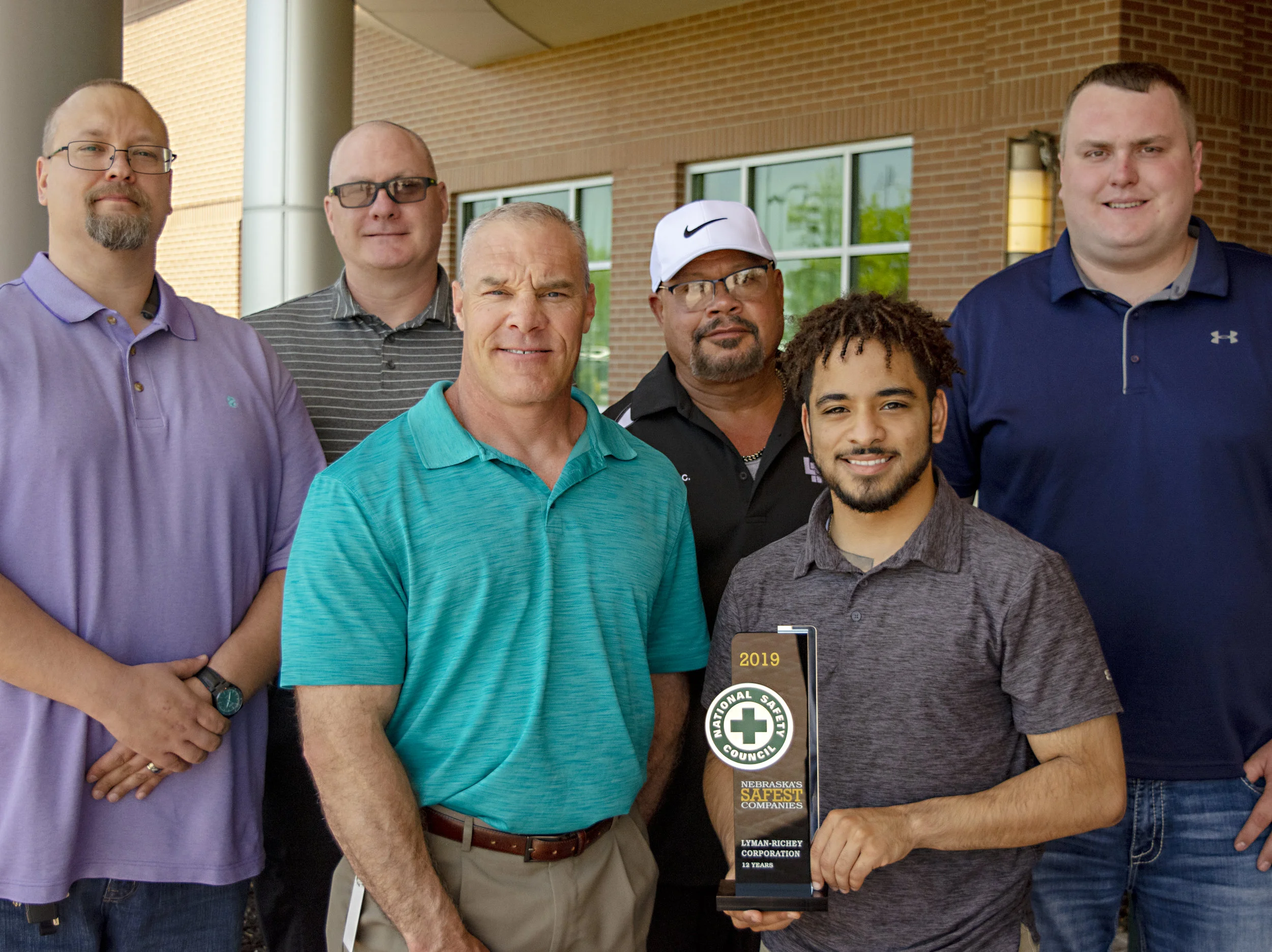 Field Safety Specialist Shawn Cassidy, Safety Director Allen Myers, Recruiter Rye Roberts, Safety Administrator George Claxton, Field Safety Specialist Dom Williams, and Field Safety Specialist Peyton Connelly accepted Lyman-Richey Corporation’s Saf…