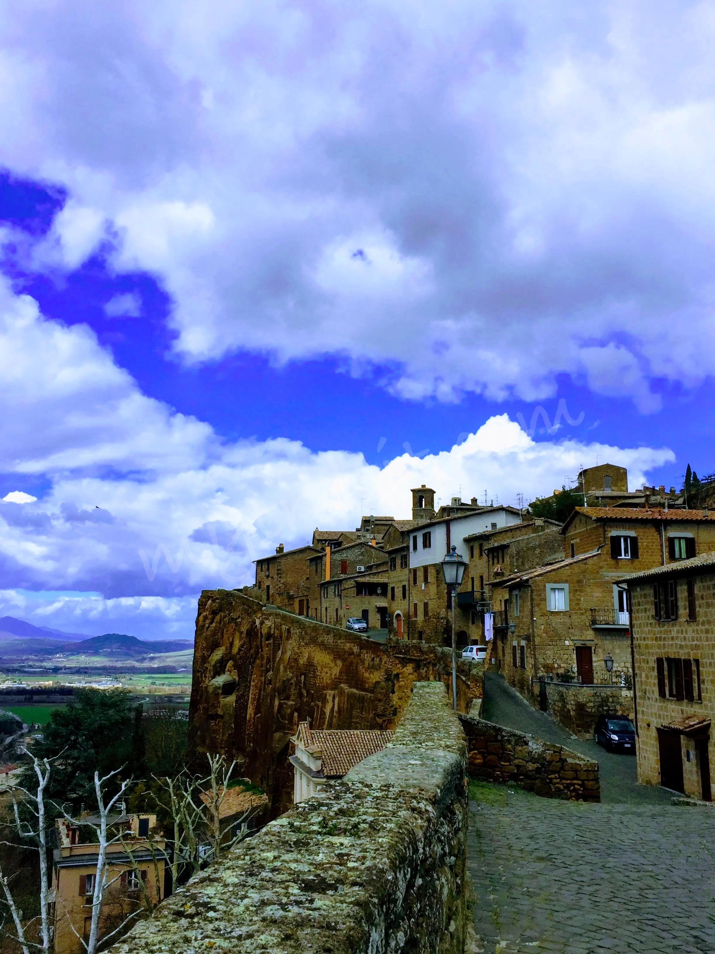 Not only is the village captivating—the views across the umbrian landscape mesmerize as well.