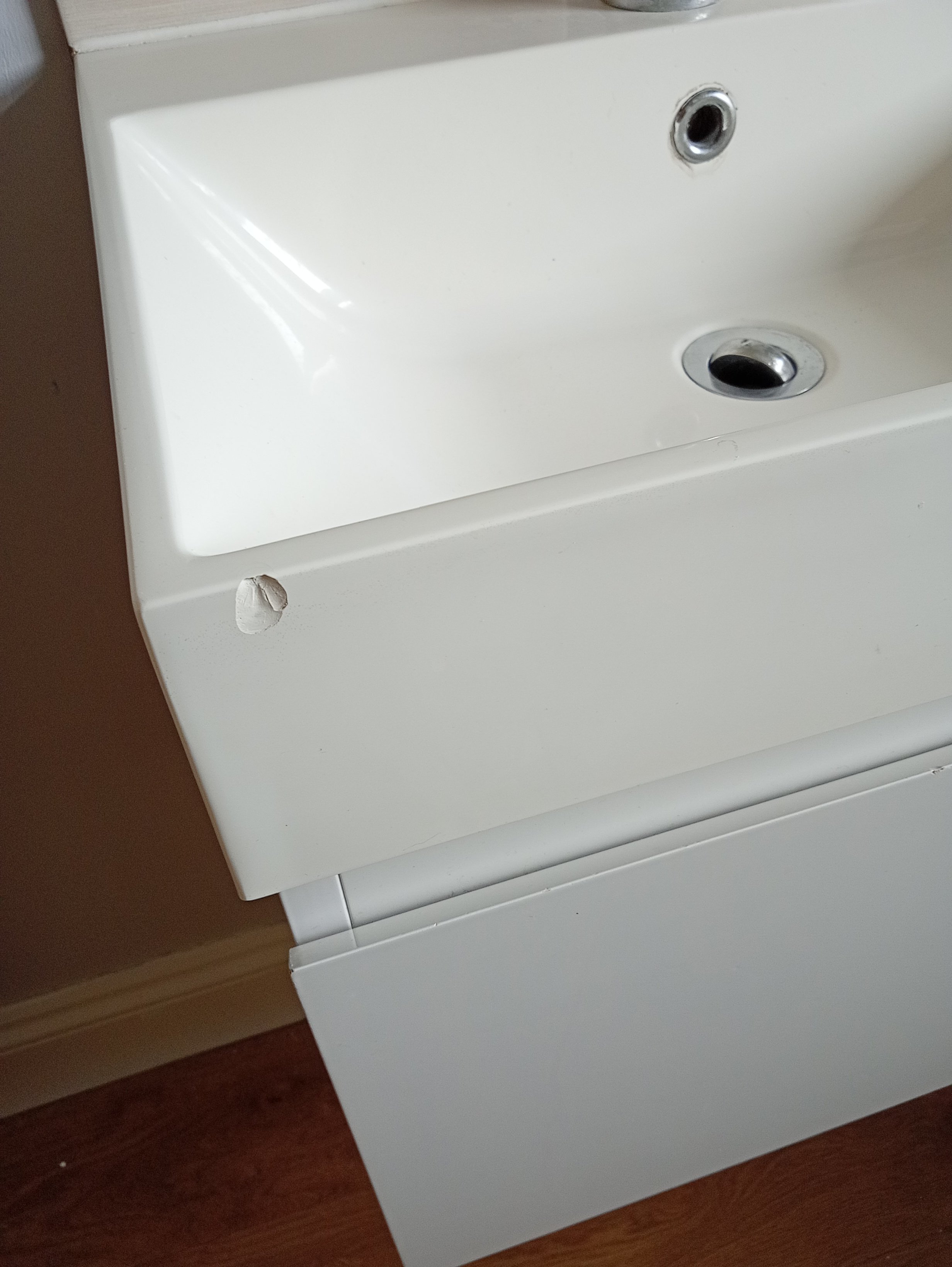 a chipped bathroom sink