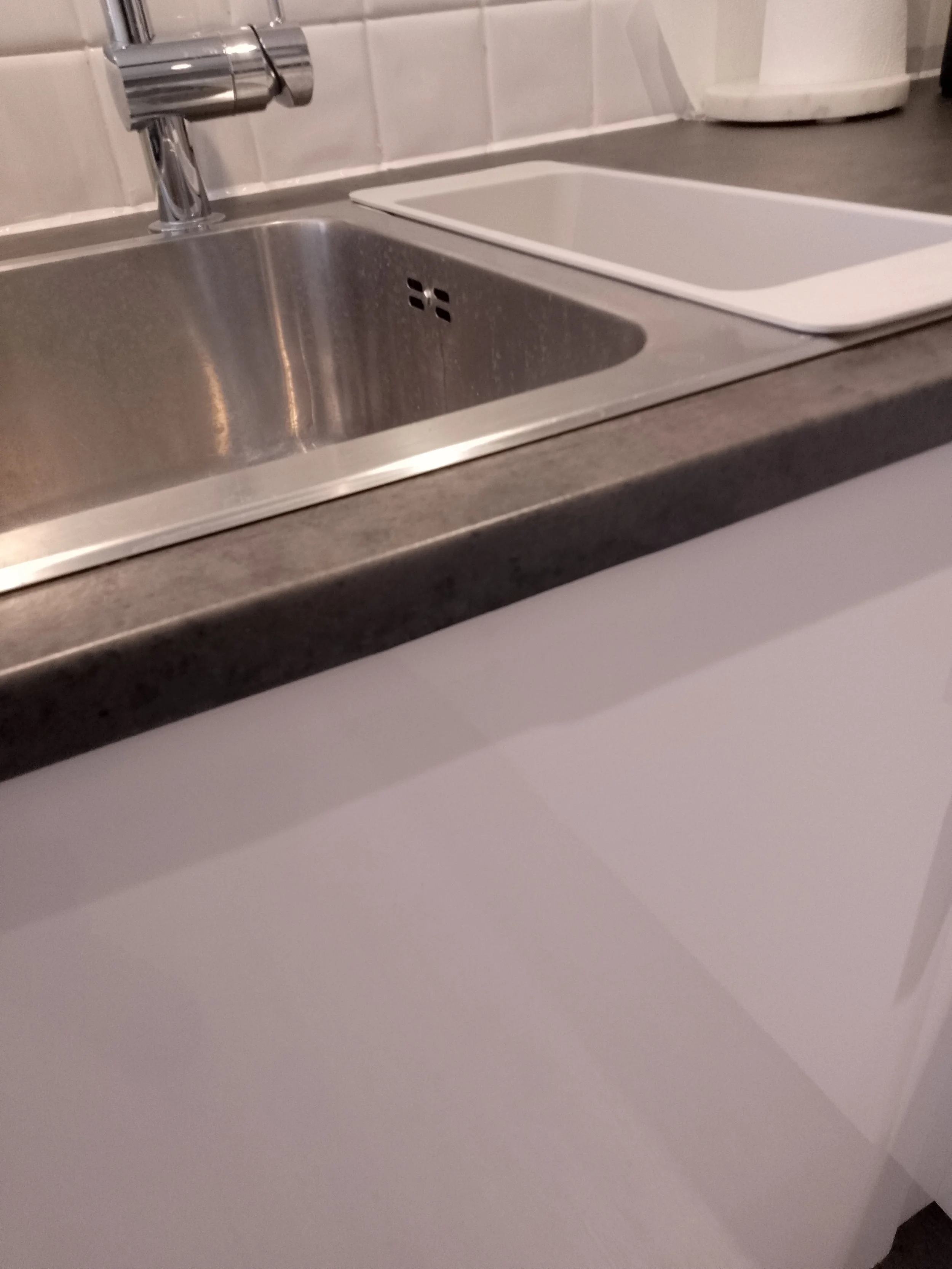 Close-up of a kitchen worktop with a repaired surface