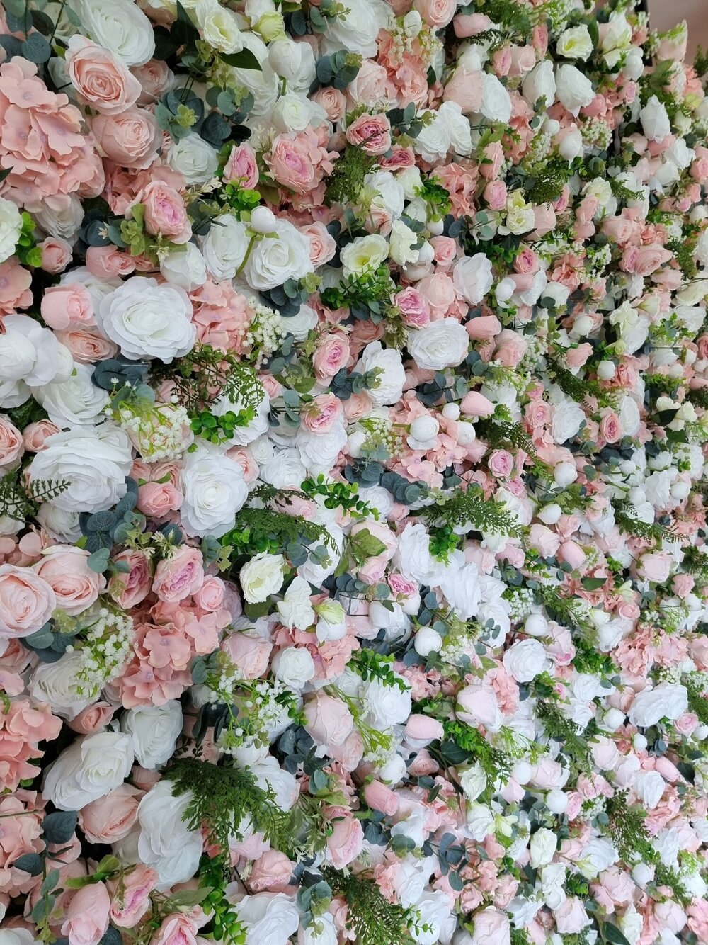 Blush Fashion Books On Pink Flower Wall