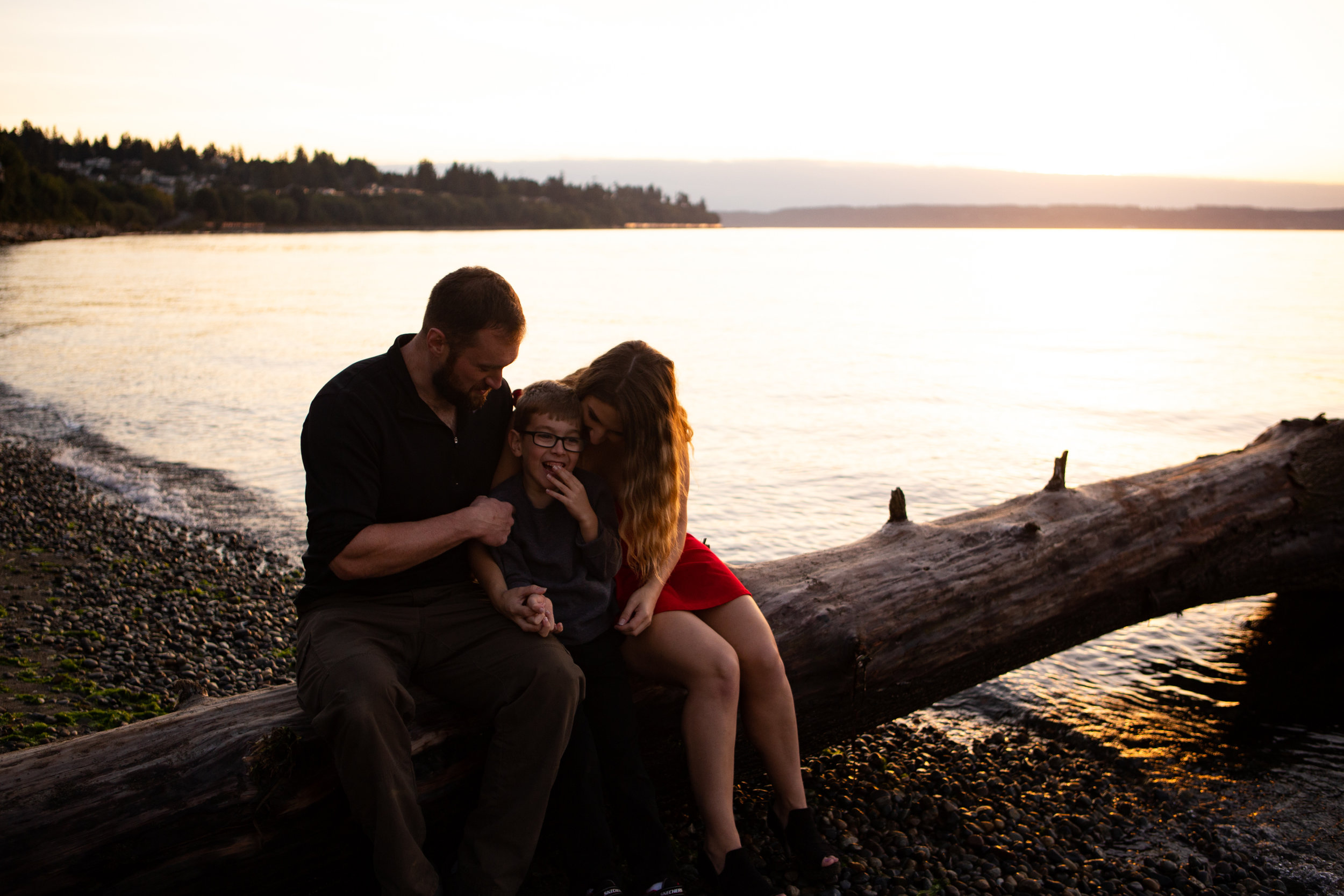 candid family moment on the beach in Everett, WA