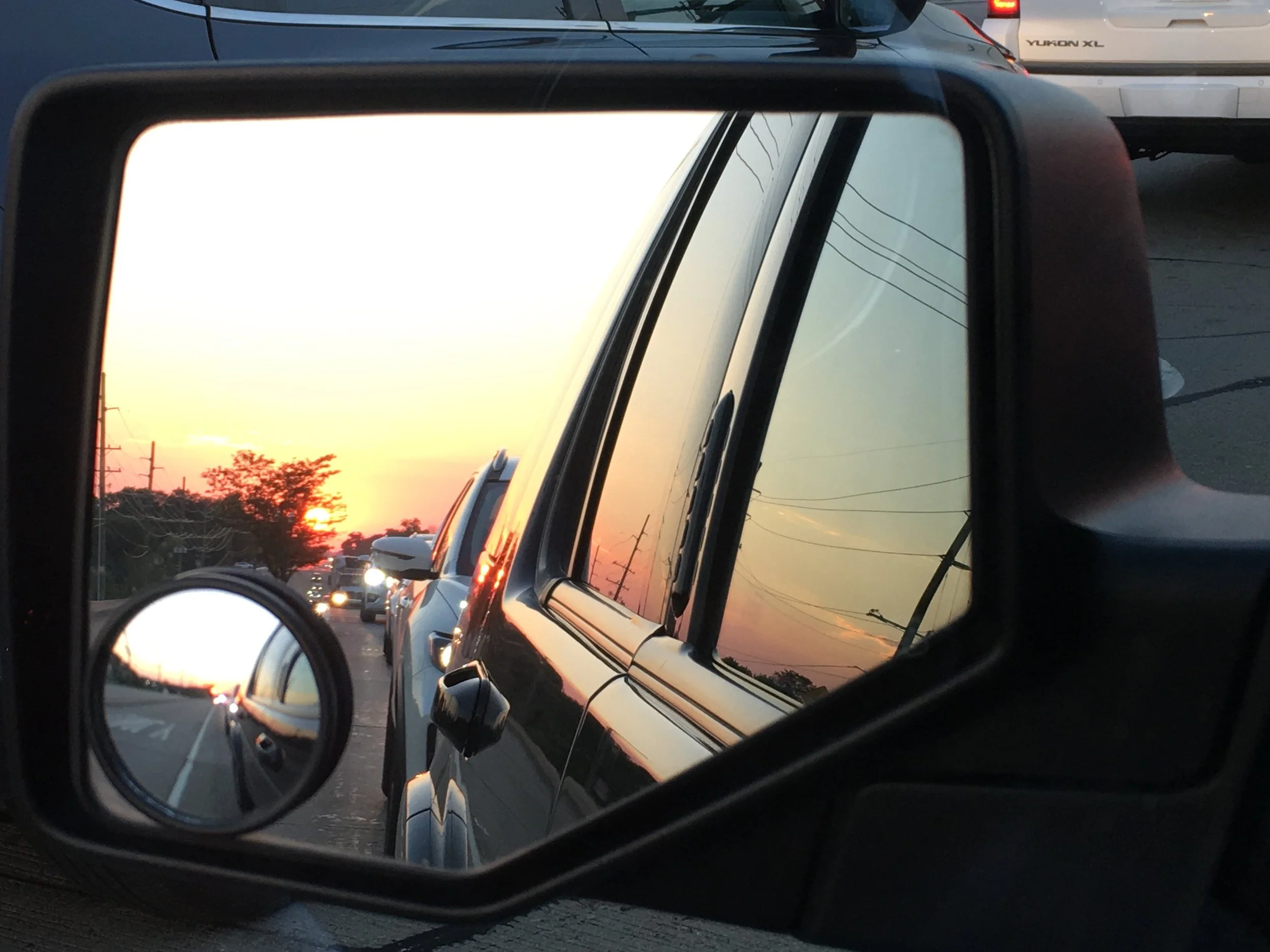 Last night I spent a long time looking at all the photos on his phone and laughed and cried a lot at all the sweet things he captured. This is one of the last photos he took. Life in the rearview mirror and another beautiful sunset.