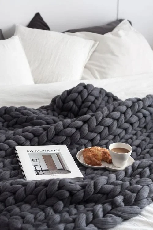 The new Interiors arm toning craze - Arm knitting.