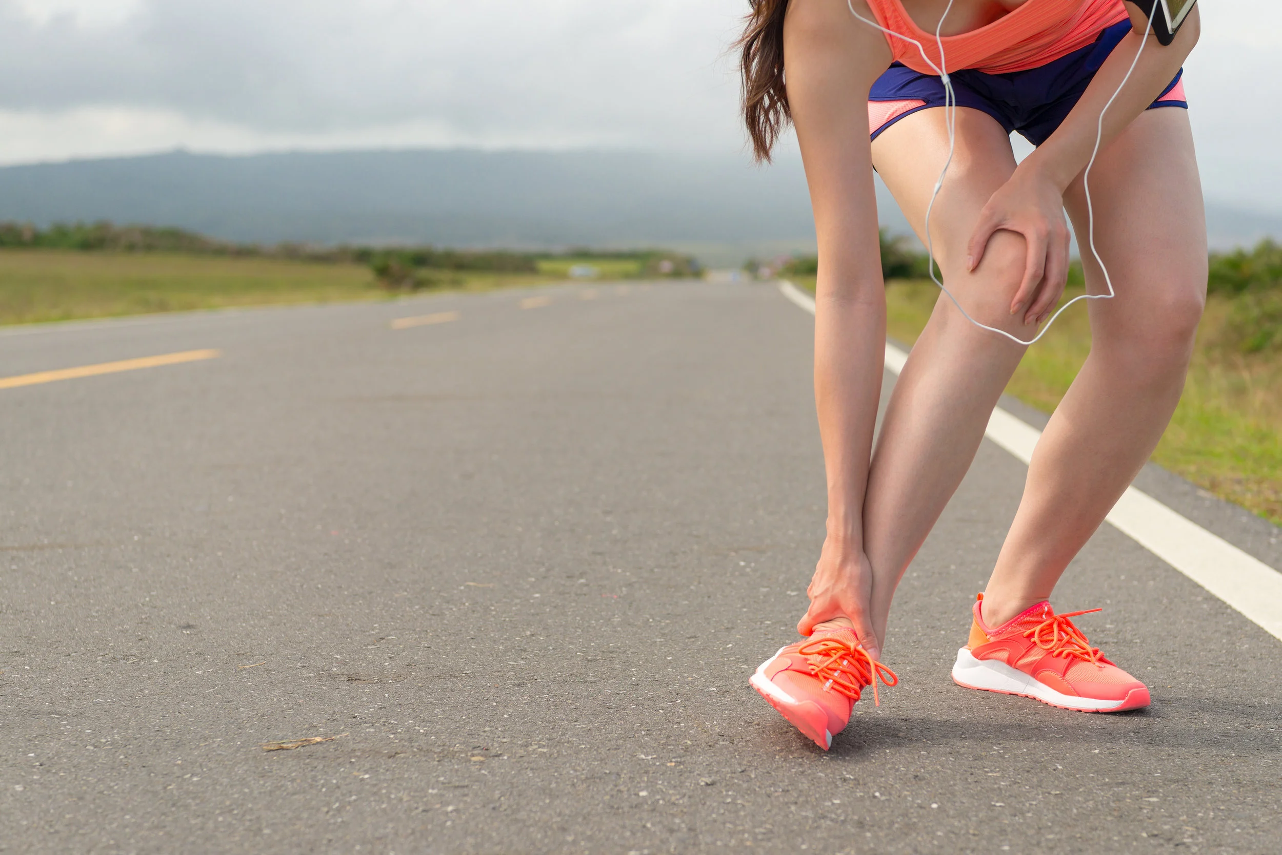 bigstock-Female-Athlete-Ankle-Injury-Wh-199041655.jpg