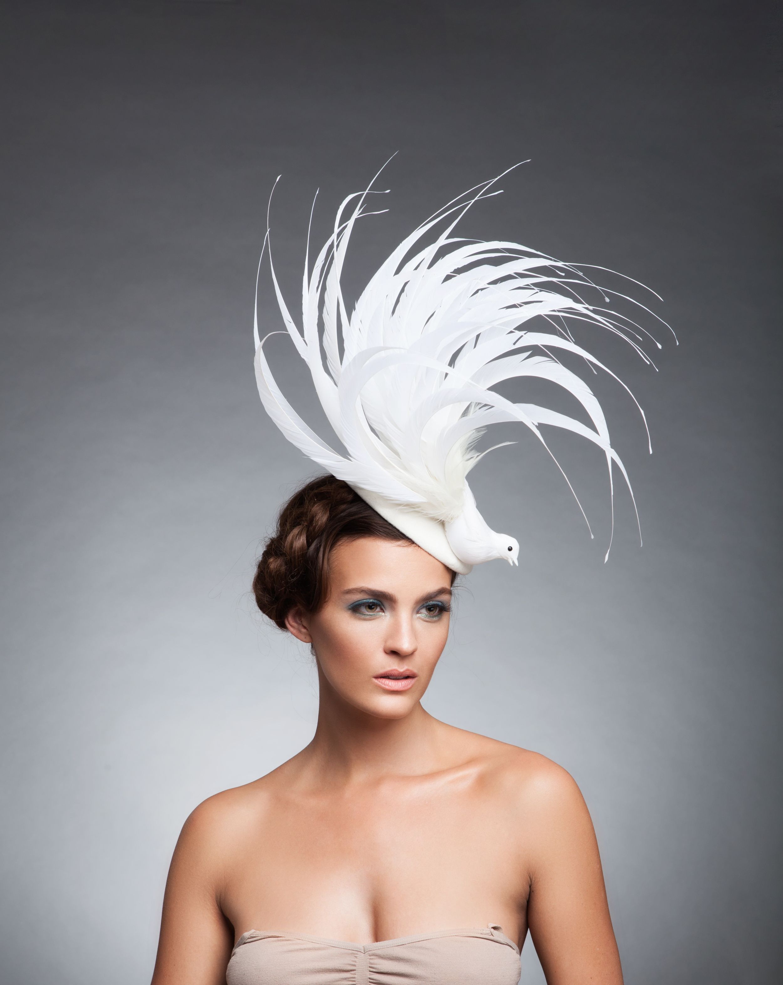 Hat designer: Arturo Rios Photographer: Mark Sacro Makeup: Dominique Lerma Hair: Tuyen Tran