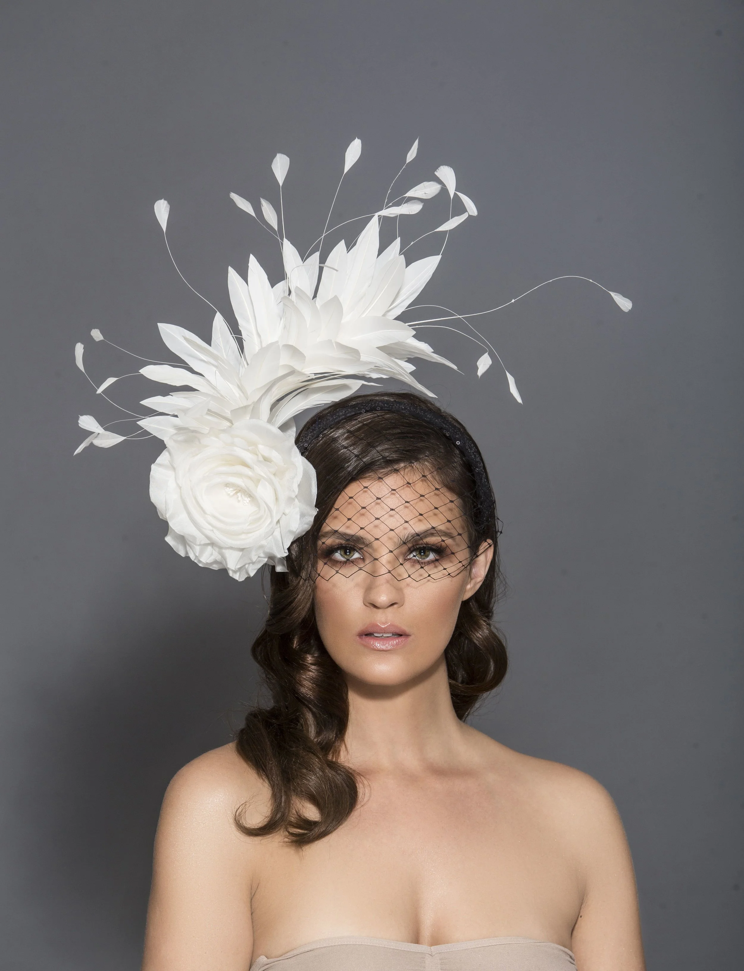 Hat designer: Arturo Rios Photographer: Mark Sacro Makeup: Dominique Lerma Hair: Tuyen Tran