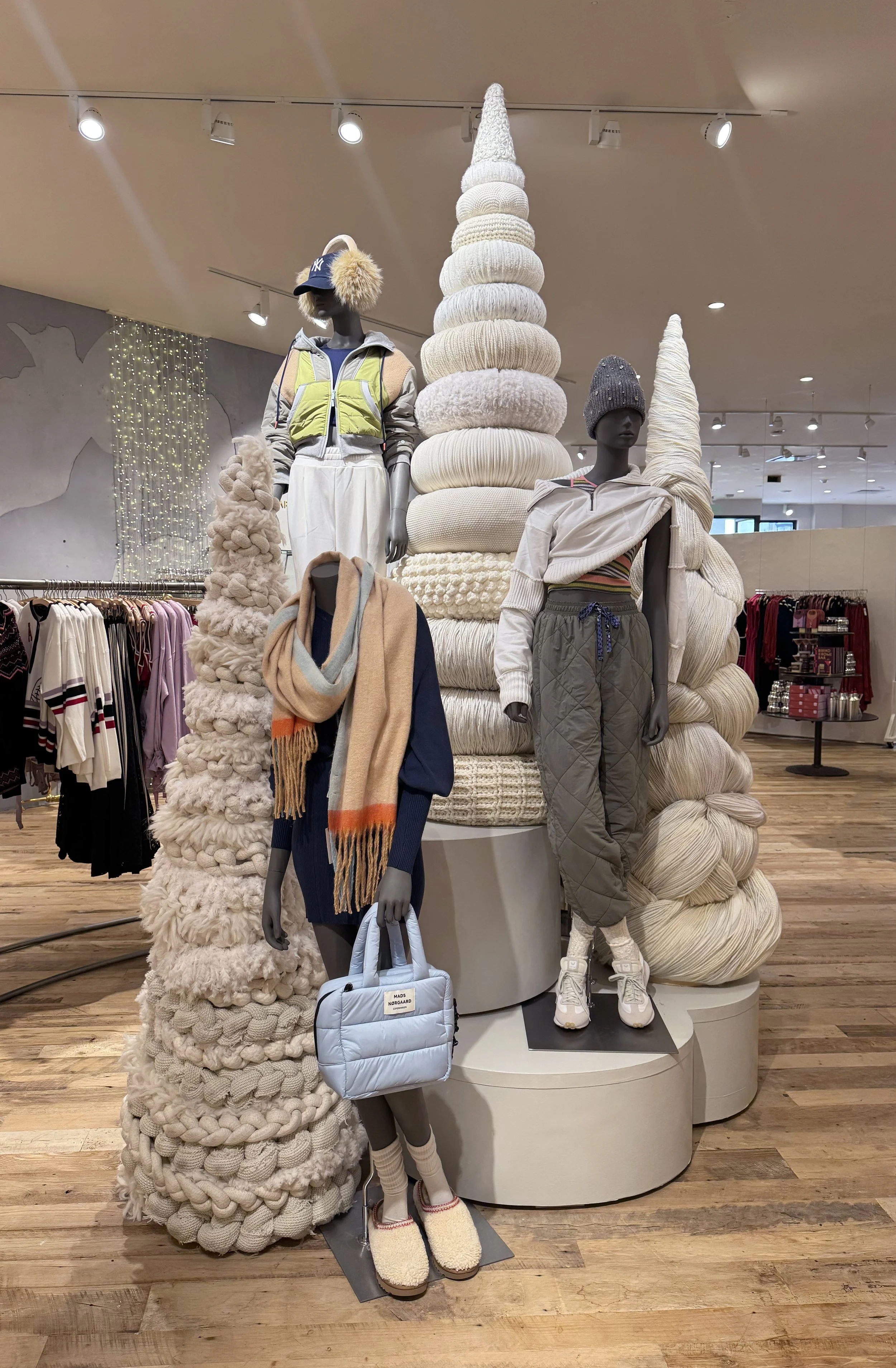    Anthropologie Holiday ‘25 Interiors:    Knit holiday layers made from different applications of yarn and crochet techniques. Trees, vespa, and gifts  constructed from mixed materials. 
