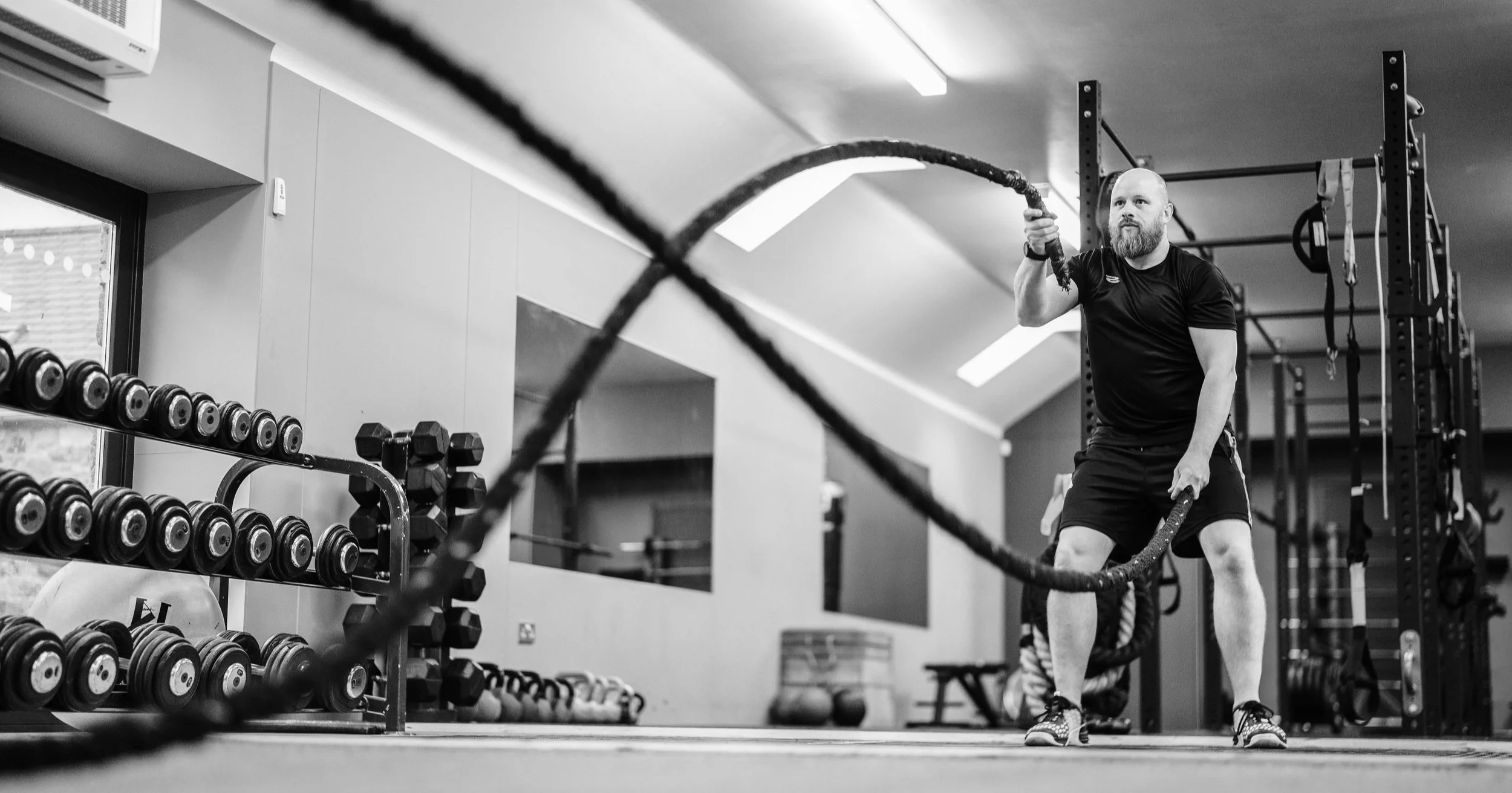 Fitness coach using ropes