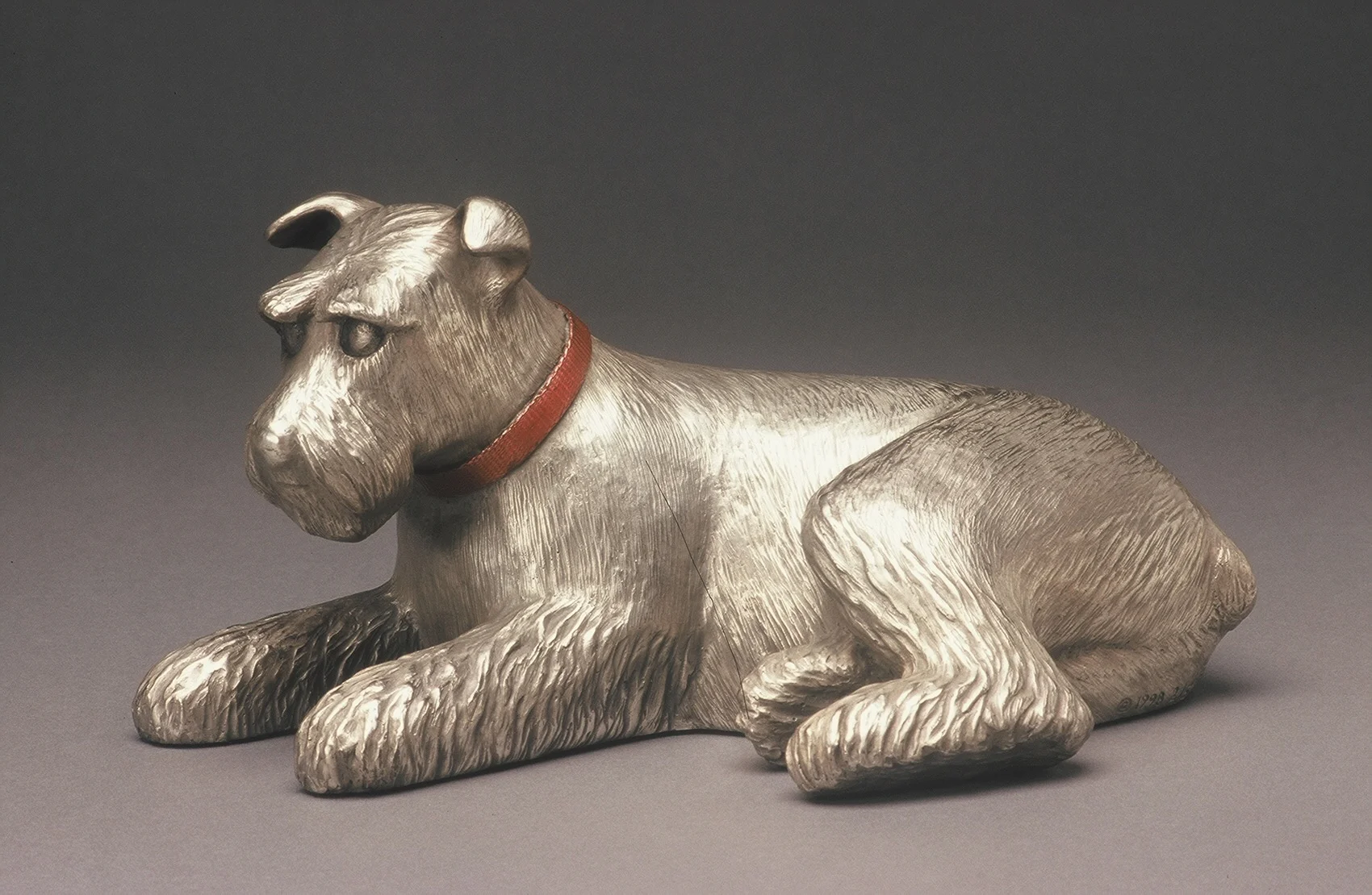 Reclining Schnauzer 6” H x 11.5” D x 8” W Bronze edition of 25 (2 remaining)