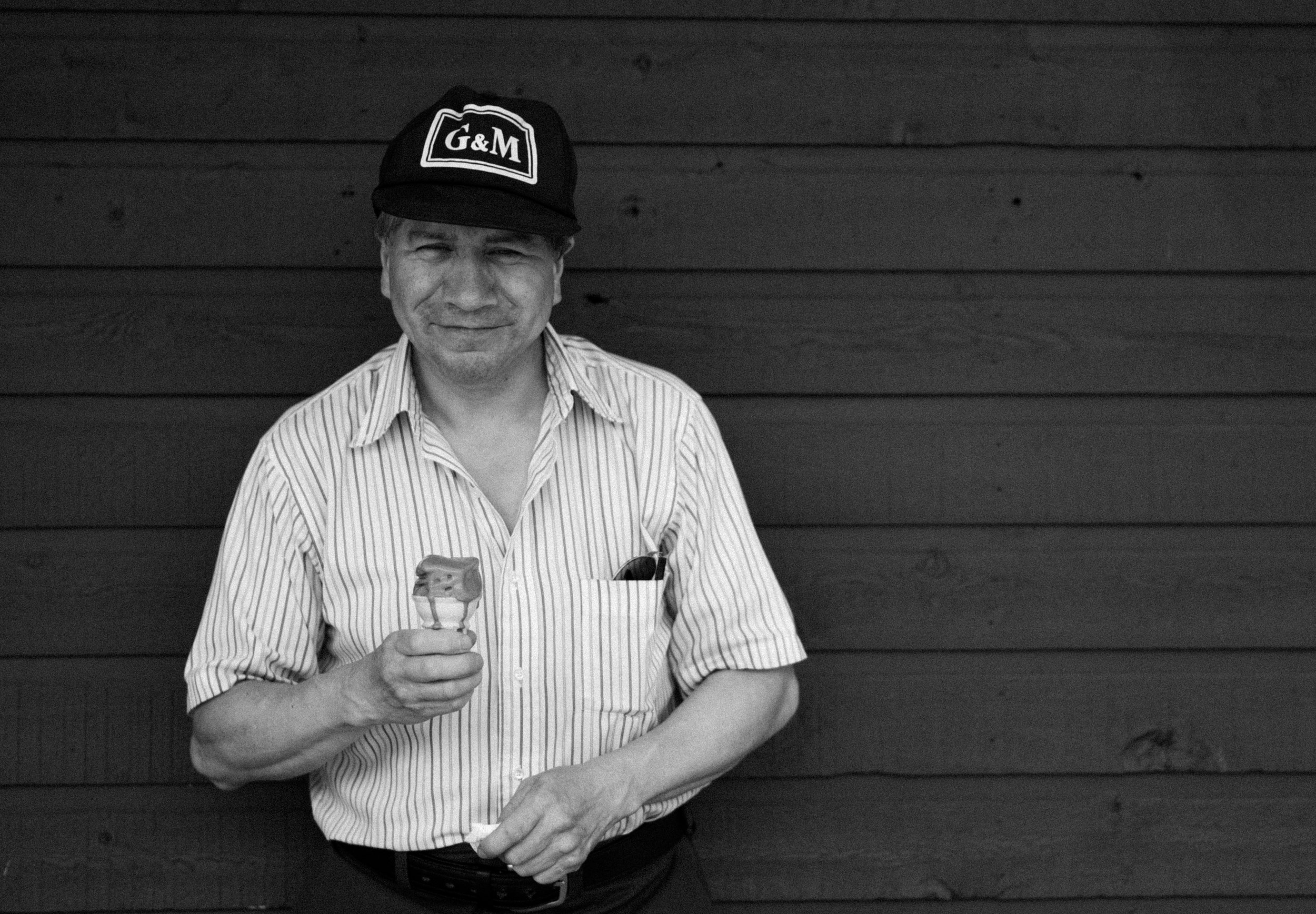 Ted Dekker poses for a portrait as he cools off on a hot summer day with a chocolate ice-cream cone at the Deep Creek General Store on Aug. 8, 2019. Dekker, a resident of Spallumcheen, has worked at the Kindale Development Association for the past 14 years.