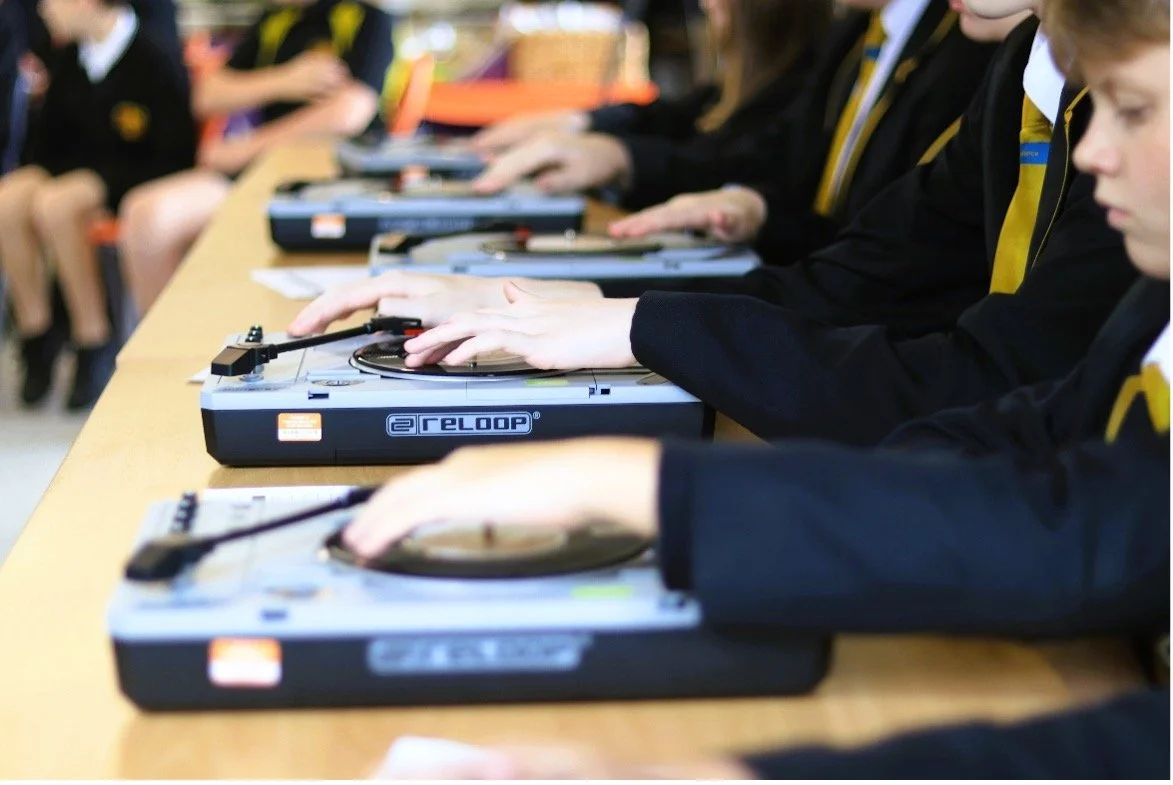 Children using turntables to make music.jpg