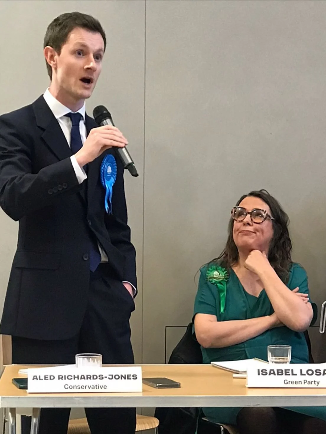 Isabel forgets to pull a neutral face while listening to a Conservative politician.

@wandsworthgreens @thegreenparty #localelections #vote #votevote @batterseasociety @battersea_women
