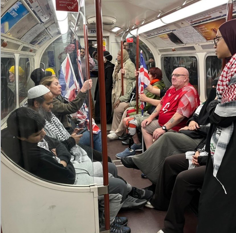 What a photo. Taken by Danny Briottet the tube in London on the day of The March for Palestine and the Tommy Robinson far right march for er, an all white England. Or something.

#photoofthemonth