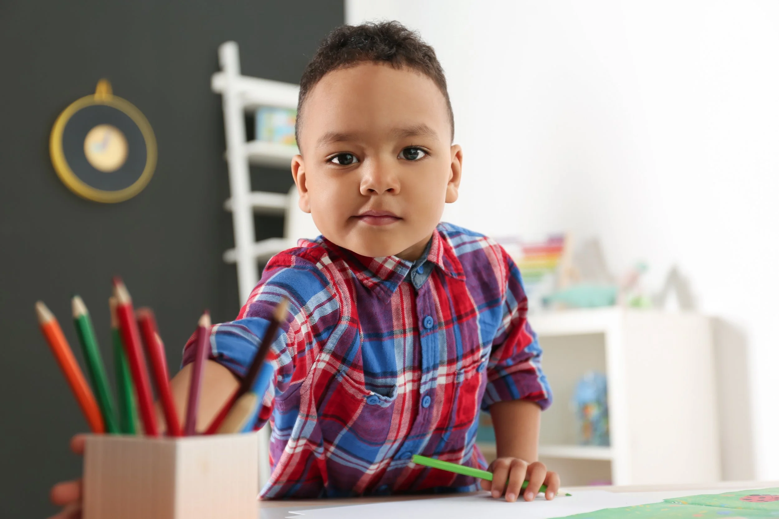 cute-little-african-american-child-drawing-at-tabl-2026-03-27-17-27-03-utc.jpg