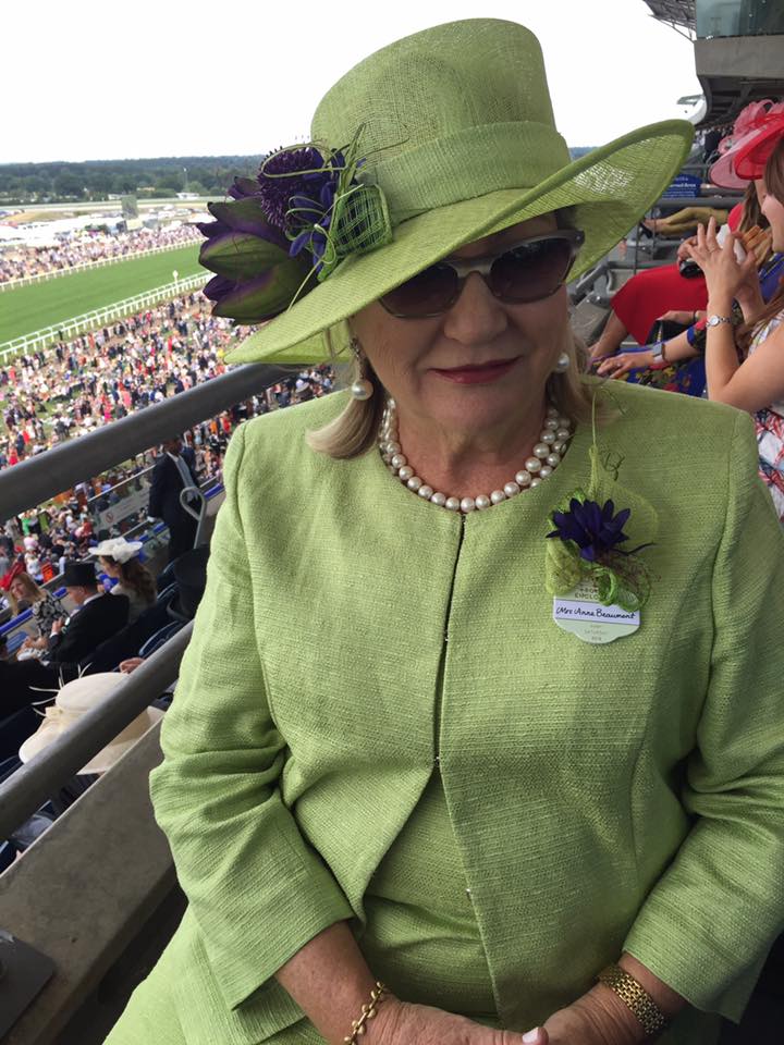 Our client Anna Beaumont wearing one of our hats with a matching corsage and Marina Rinaldi outfit. Doesn’t it look lovely on her?