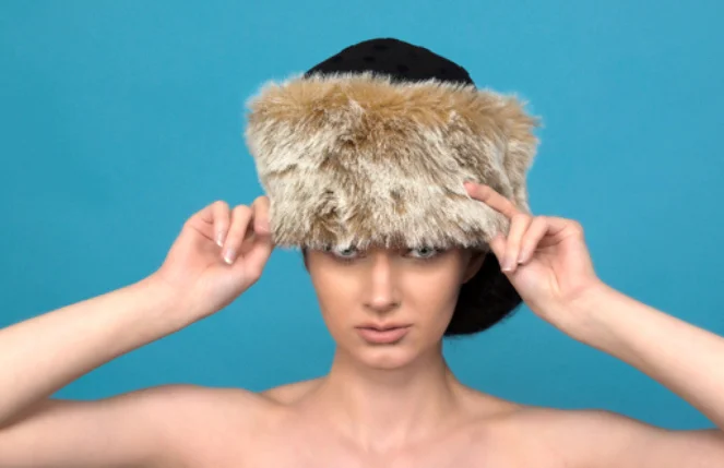 This winter headpiece is inspired from a Russian woman’s style made with felt and luxury faux fur.