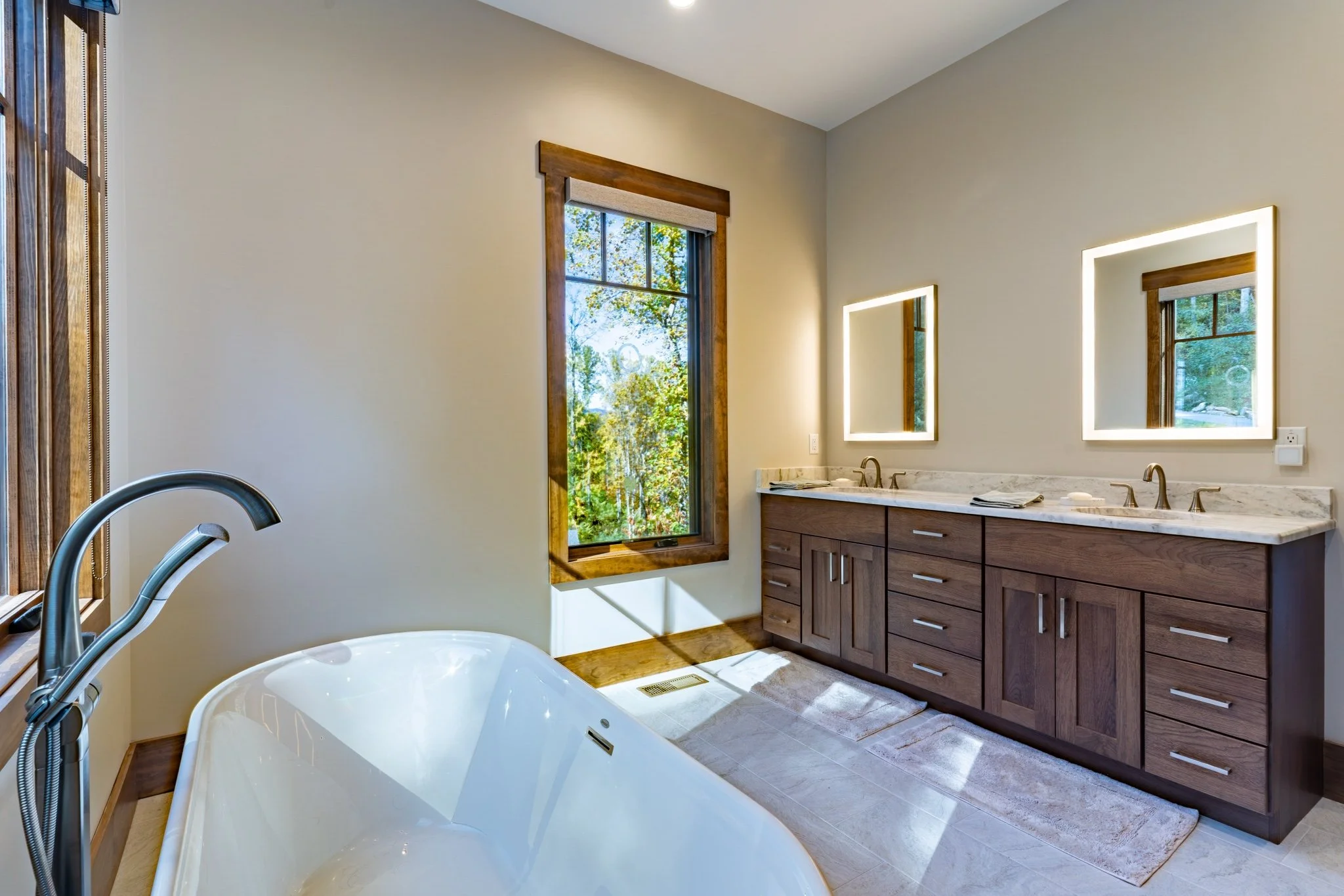 asheville-master-bathroom-double-vanity-backlit-mirrors.jpg