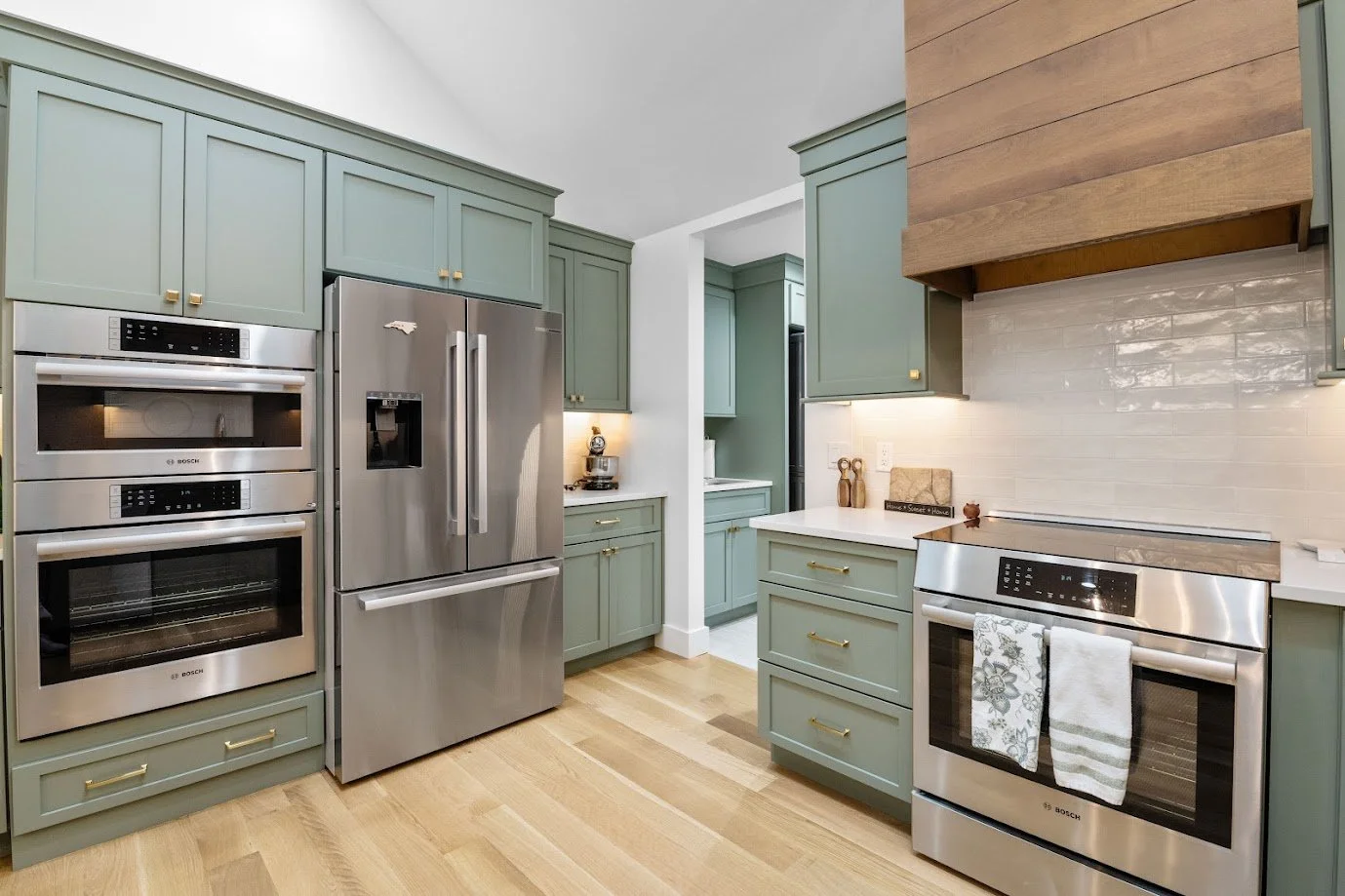 asheville-kitchen-remodel-bosch-double-oven-starmark-sage-green-cabinets.jpg