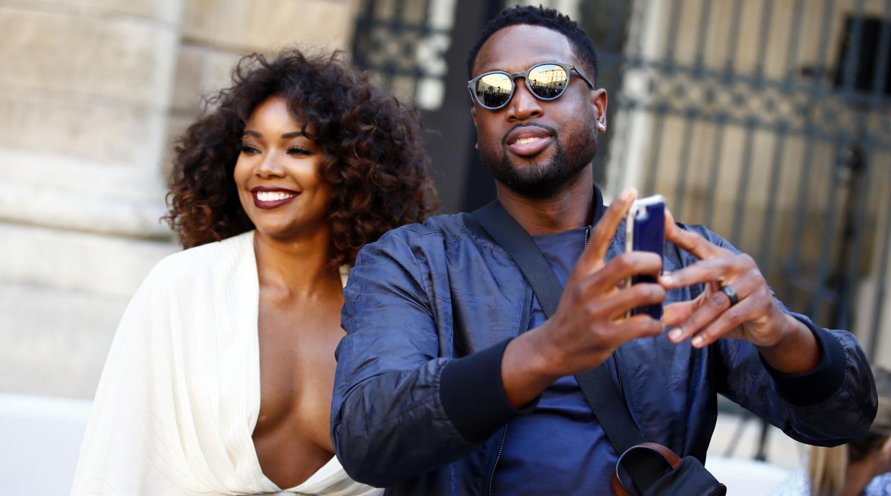 Gabrielle Union-Wade and Dwyane Wade in Paris for fashion week.