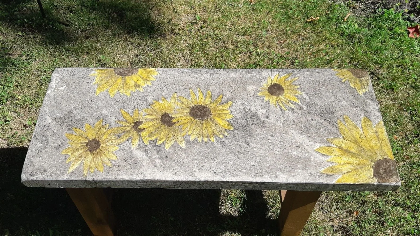 Kiwi Tuscany Concrete Sunflower bench resized.jpg