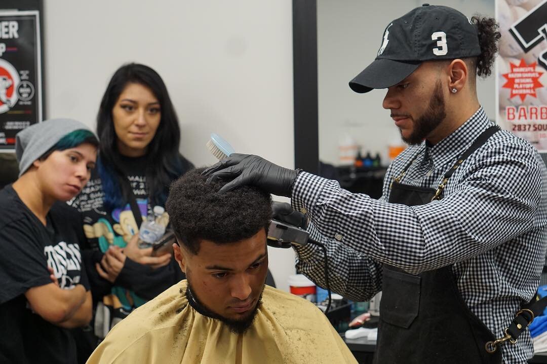 $100 = a license fee for a graduating barber