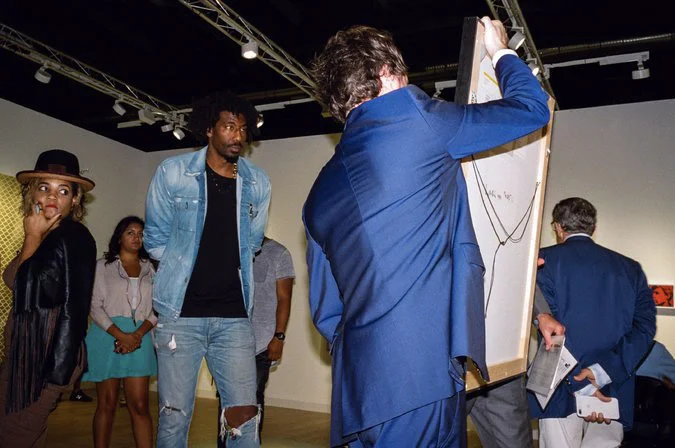 Former Knick Amar’e Stoudemire, who has amassed a notable art collection, at Art Basel in Miami in December. Credit Daniel Arnold for The New York Times